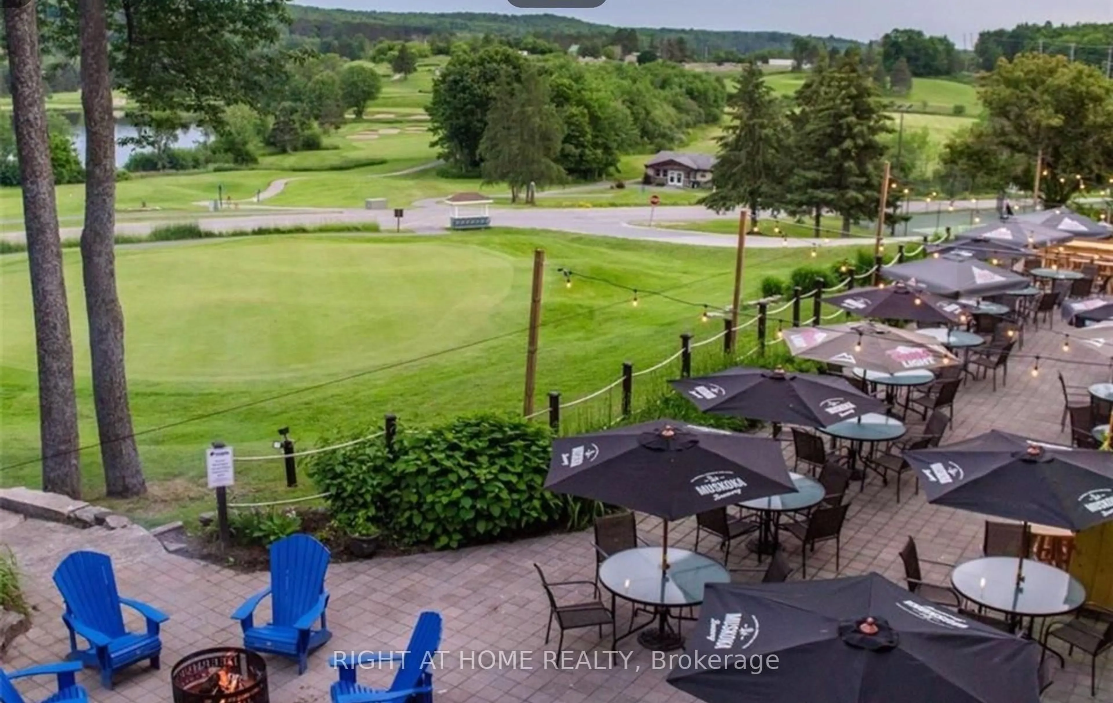 A pic from outside/outdoor area/front of a property/back of a property/a pic from drone, water/lake/river/ocean view for 1235 Deerhurst Dr #210, Huntsville Ontario P1H 2E8