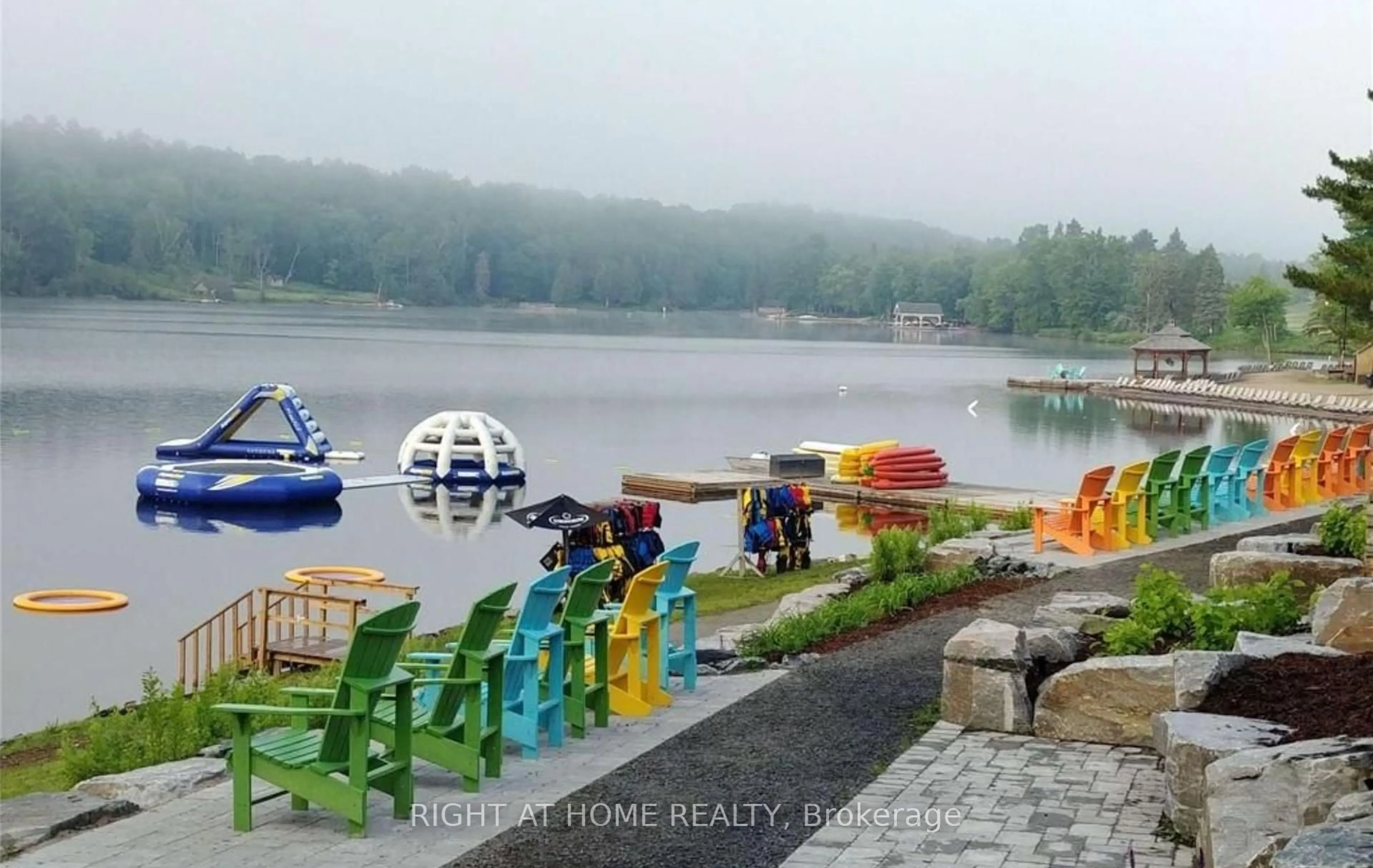 Patio, water/lake/river/ocean view for 1235 Deerhurst Dr #210, Huntsville Ontario P1H 2E8
