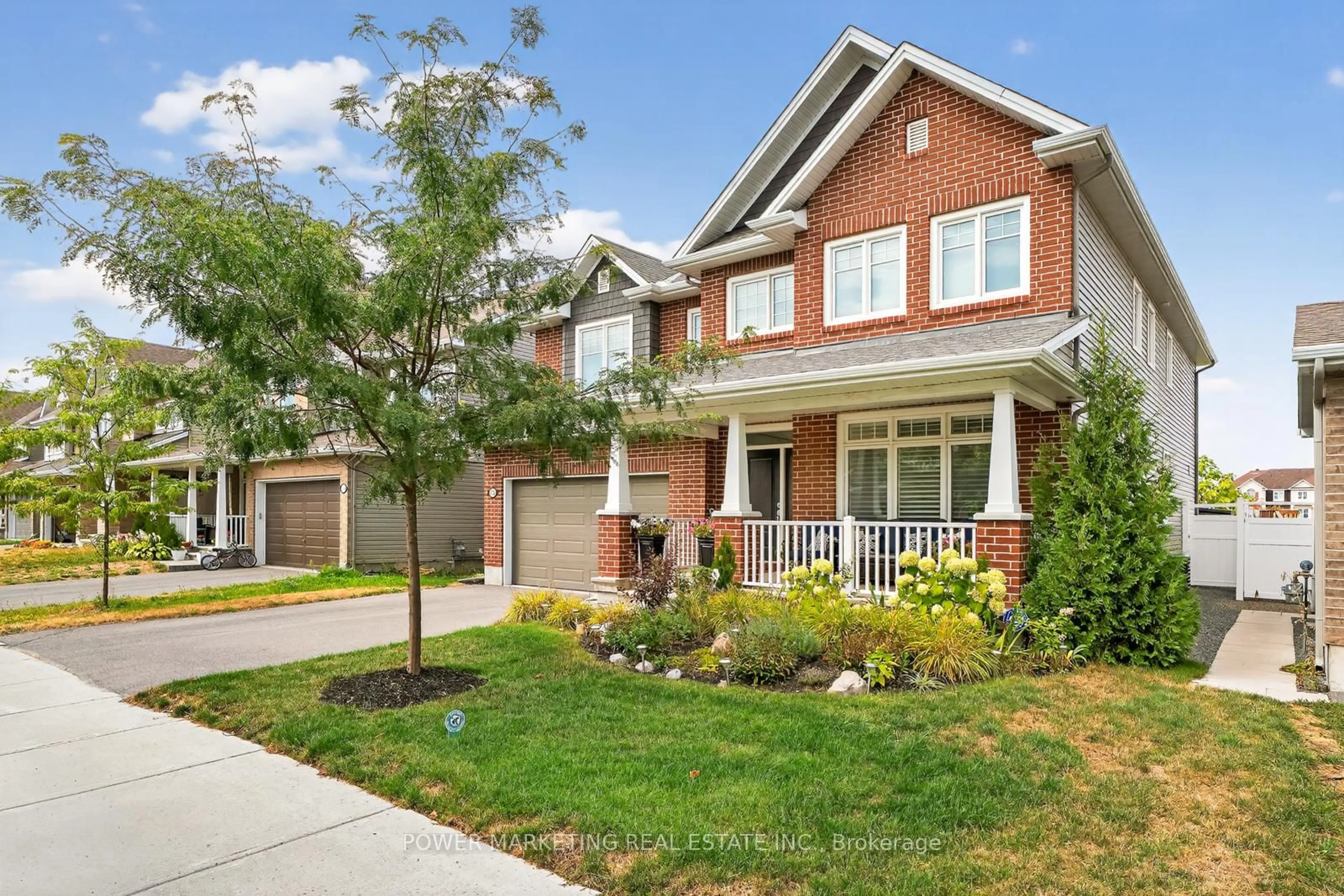 Home with brick exterior material, street for 692 EGRET Way, Ottawa Ontario K2J 0X4