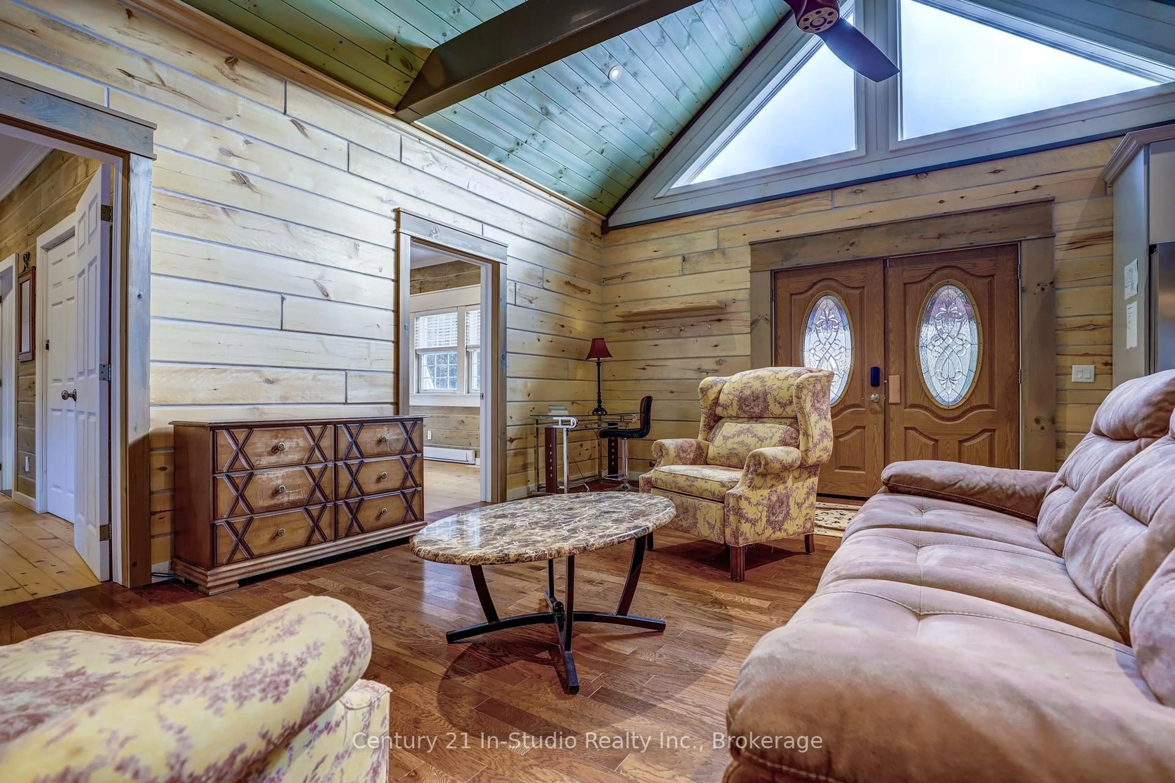 Living room with furniture, wood/laminate floor for 25 Maple Golf Cres, Northern Bruce Peninsula Ontario N0H 2R0