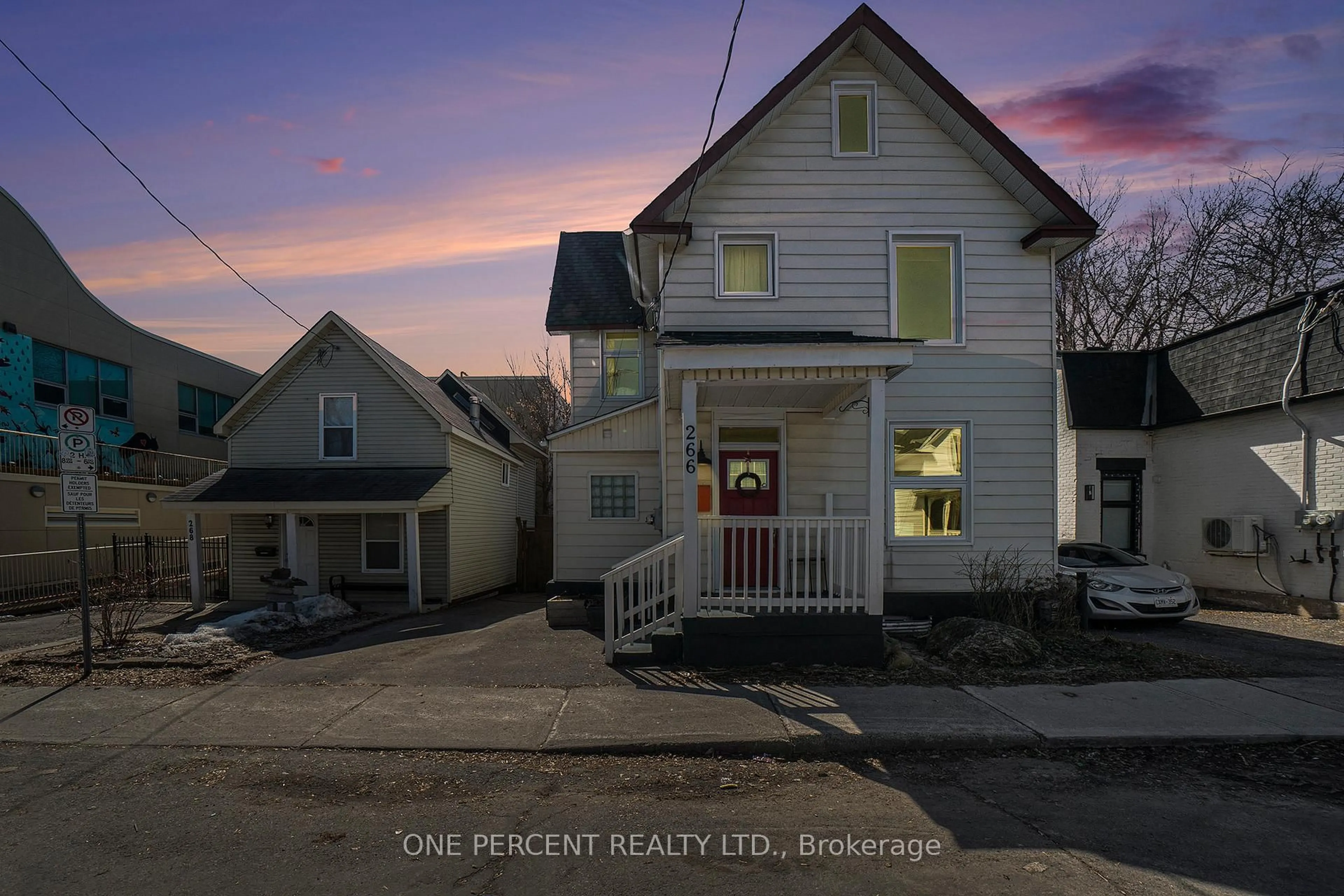 A pic from outside/outdoor area/front of a property/back of a property/a pic from drone, street for 266 Bradley Ave, Ottawa Ontario K1L 7E9