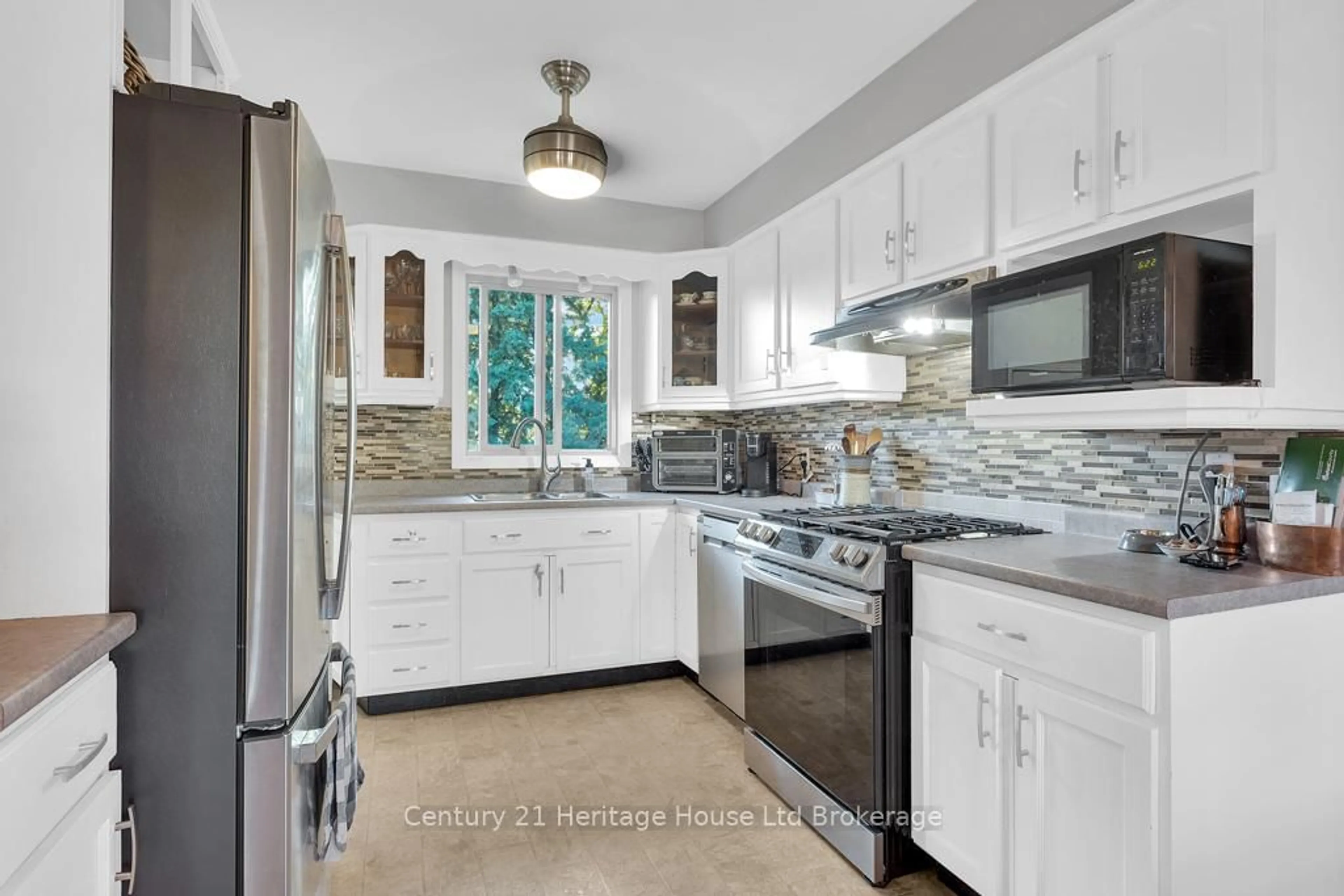 Open concept kitchen, ceramic/tile floor for 84 Denrich Ave, Tillsonburg Ontario N4G 4X7