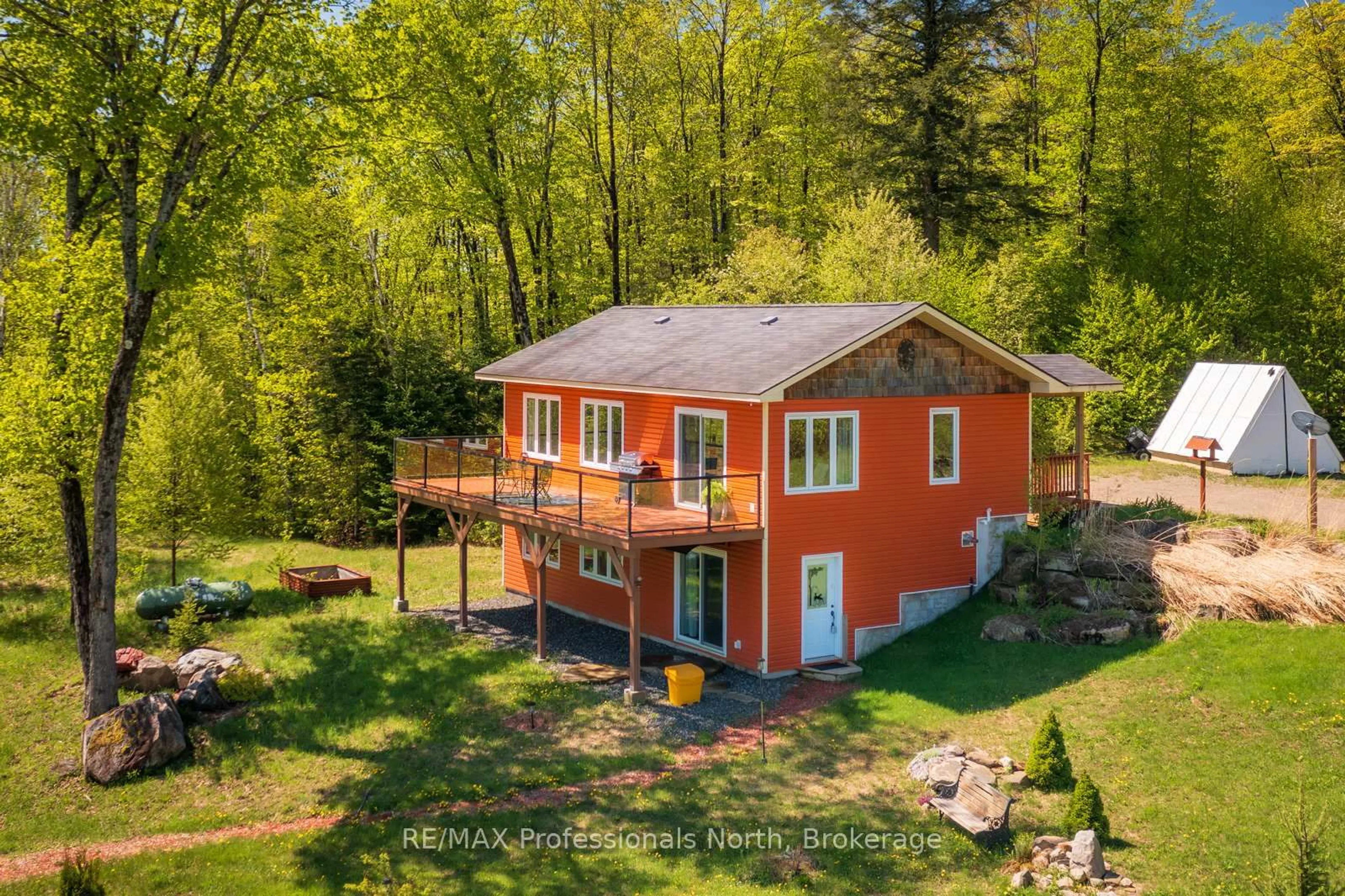A pic from outside/outdoor area/front of a property/back of a property/a pic from drone, water/lake/river/ocean view for 4043 Highway 60, Algonquin Highlands Ontario P0A 1H0
