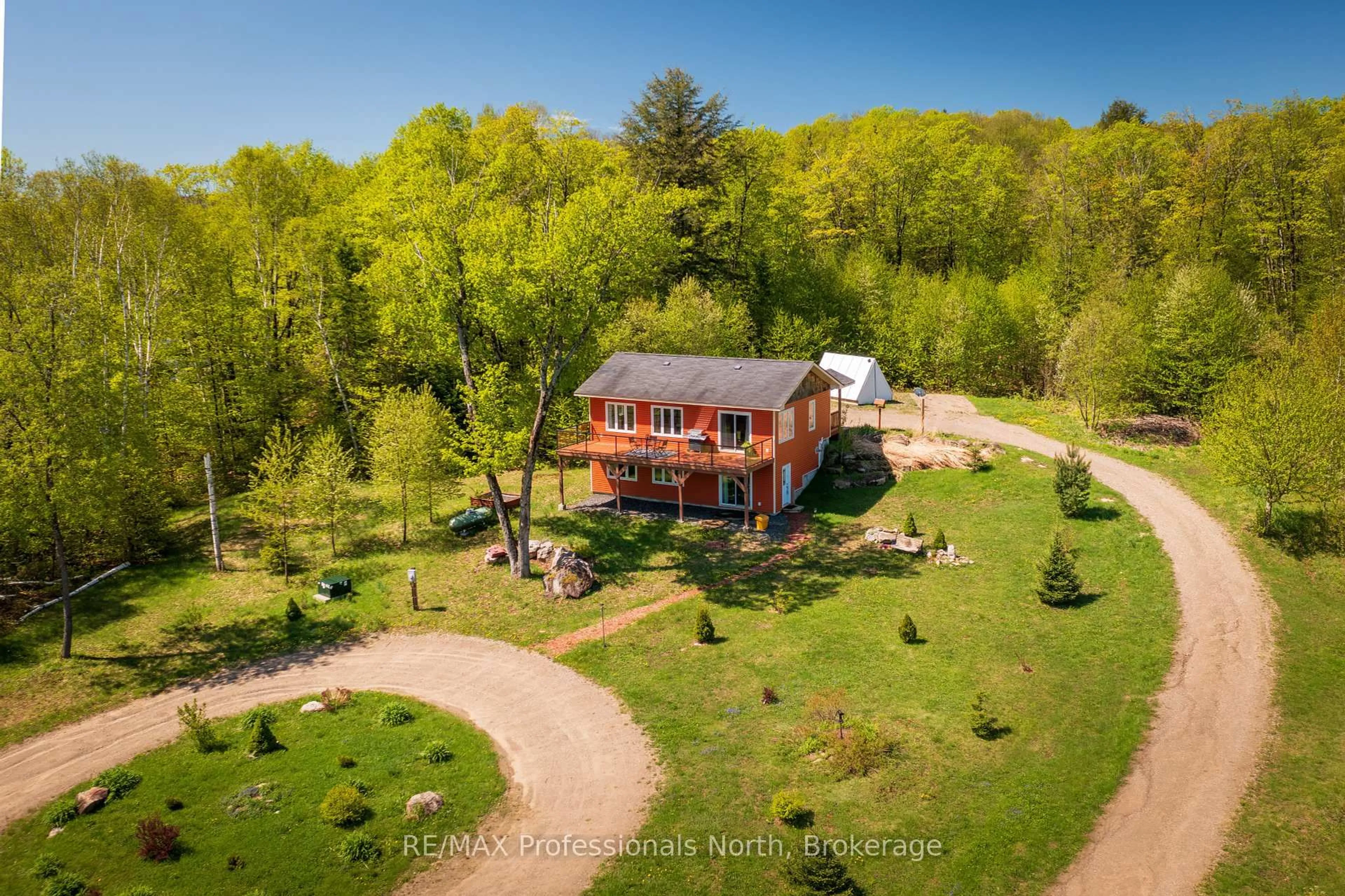 A pic from outside/outdoor area/front of a property/back of a property/a pic from drone, unknown for 4043 Highway 60, Algonquin Highlands Ontario P0A 1H0