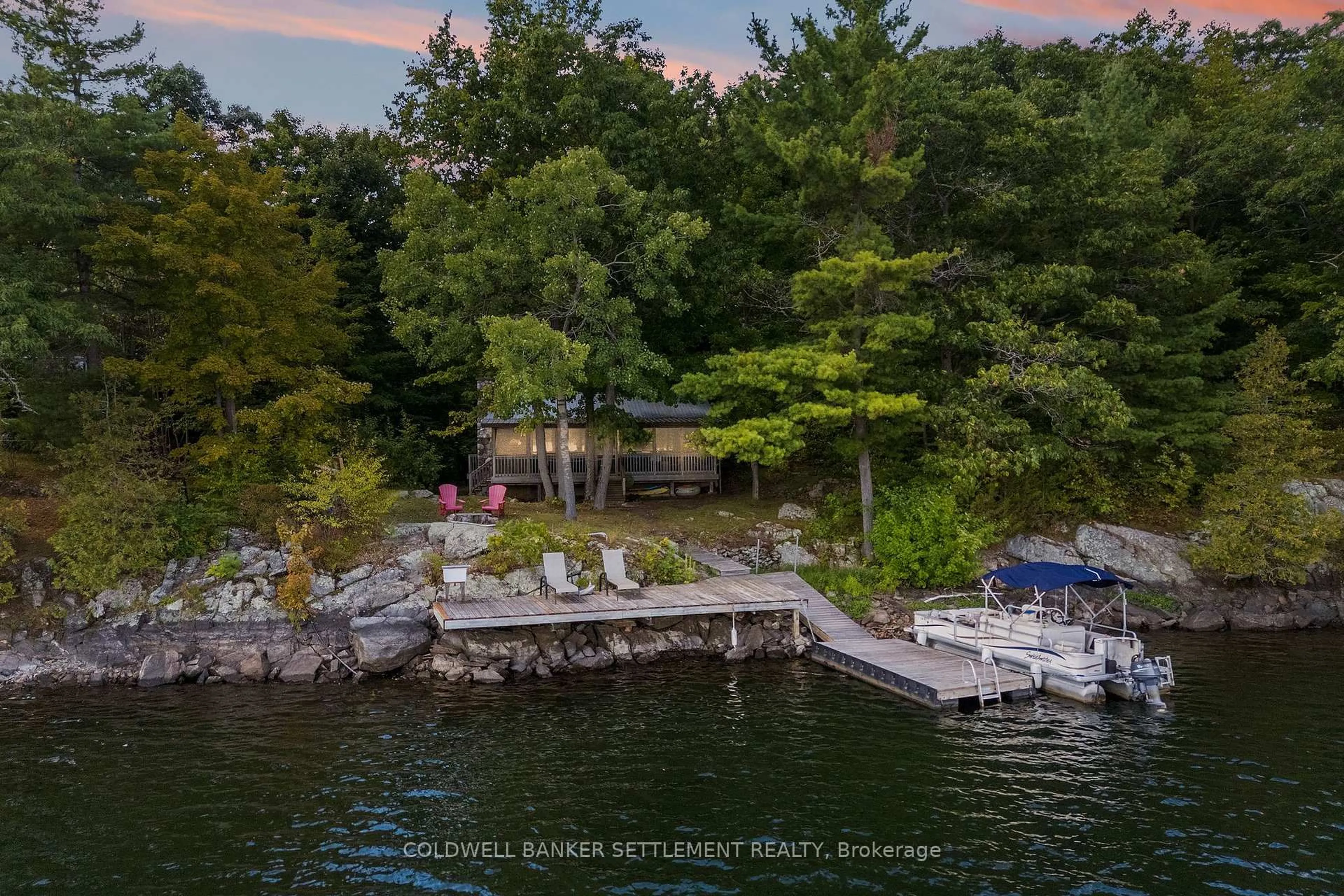 A pic from outside/outdoor area/front of a property/back of a property/a pic from drone, water/lake/river/ocean view for 51 Partridge Lane, Maberly Ontario K0H 2B0