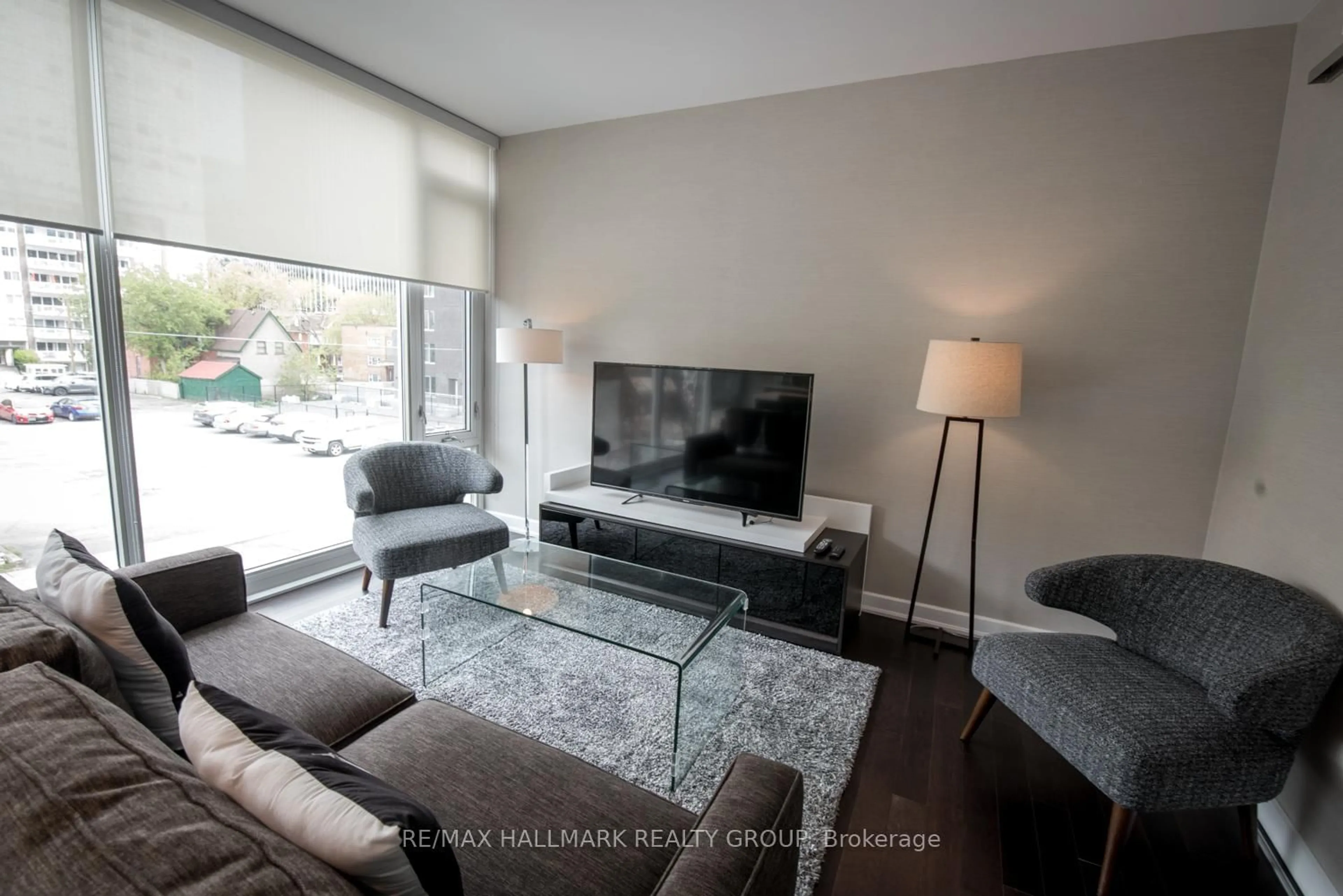 Living room with furniture, unknown for 300 Lisgar St #213, Ottawa Ontario K2P 0E2