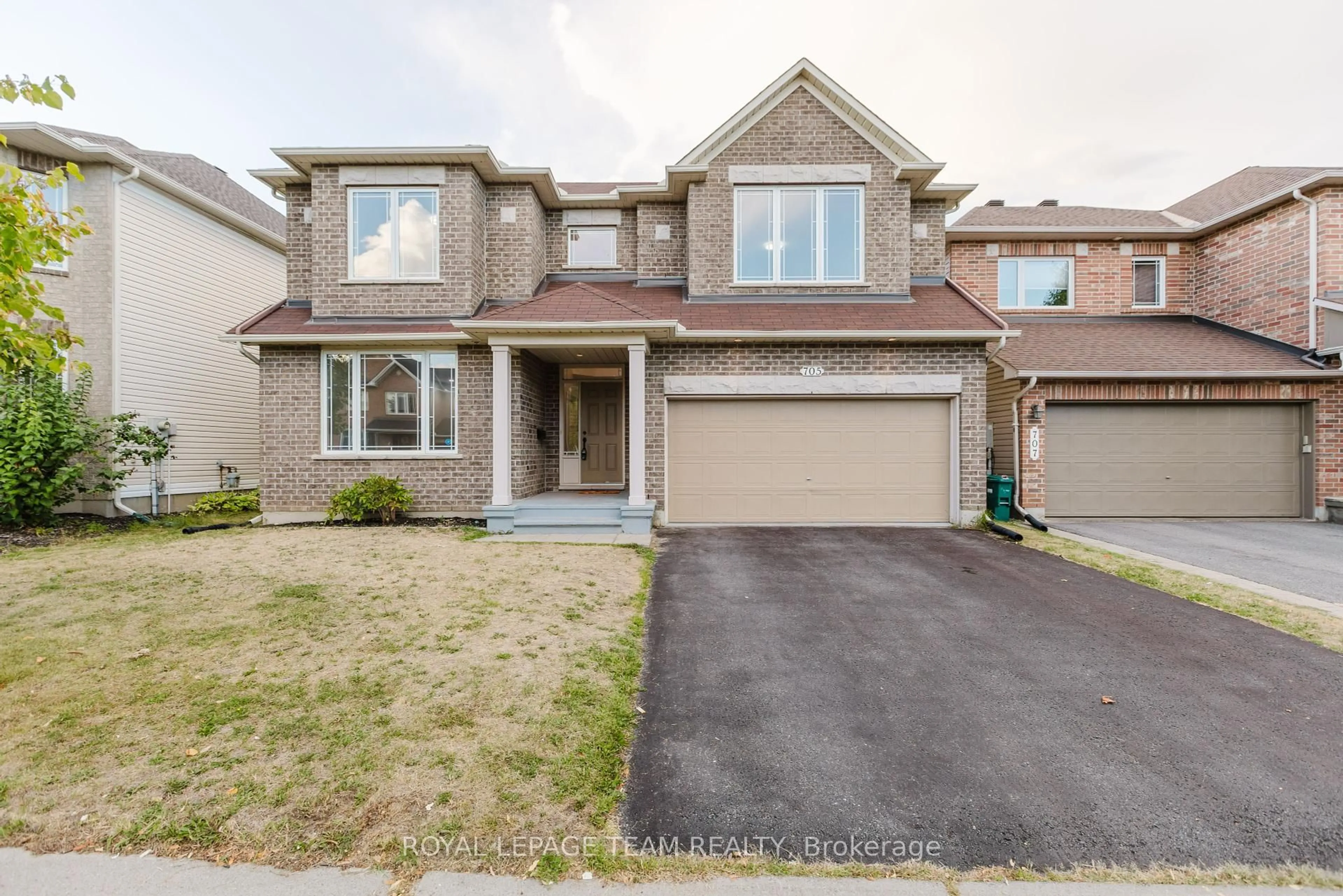Home with brick exterior material, street for 705 Clearbrook Dr, Ottawa Ontario K2J 5P1