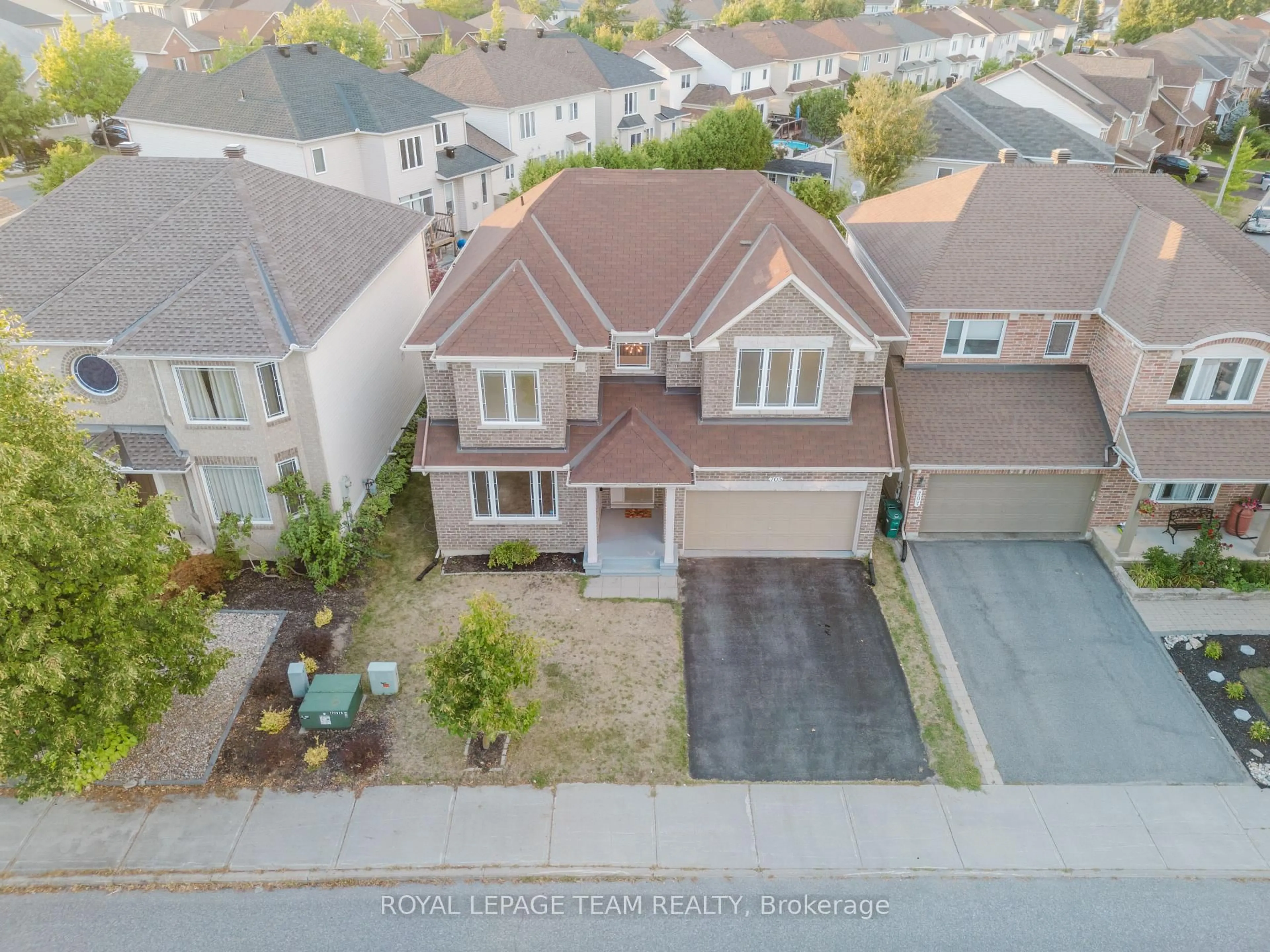 A pic from outside/outdoor area/front of a property/back of a property/a pic from drone, street for 705 Clearbrook Dr, Ottawa Ontario K2J 5P1