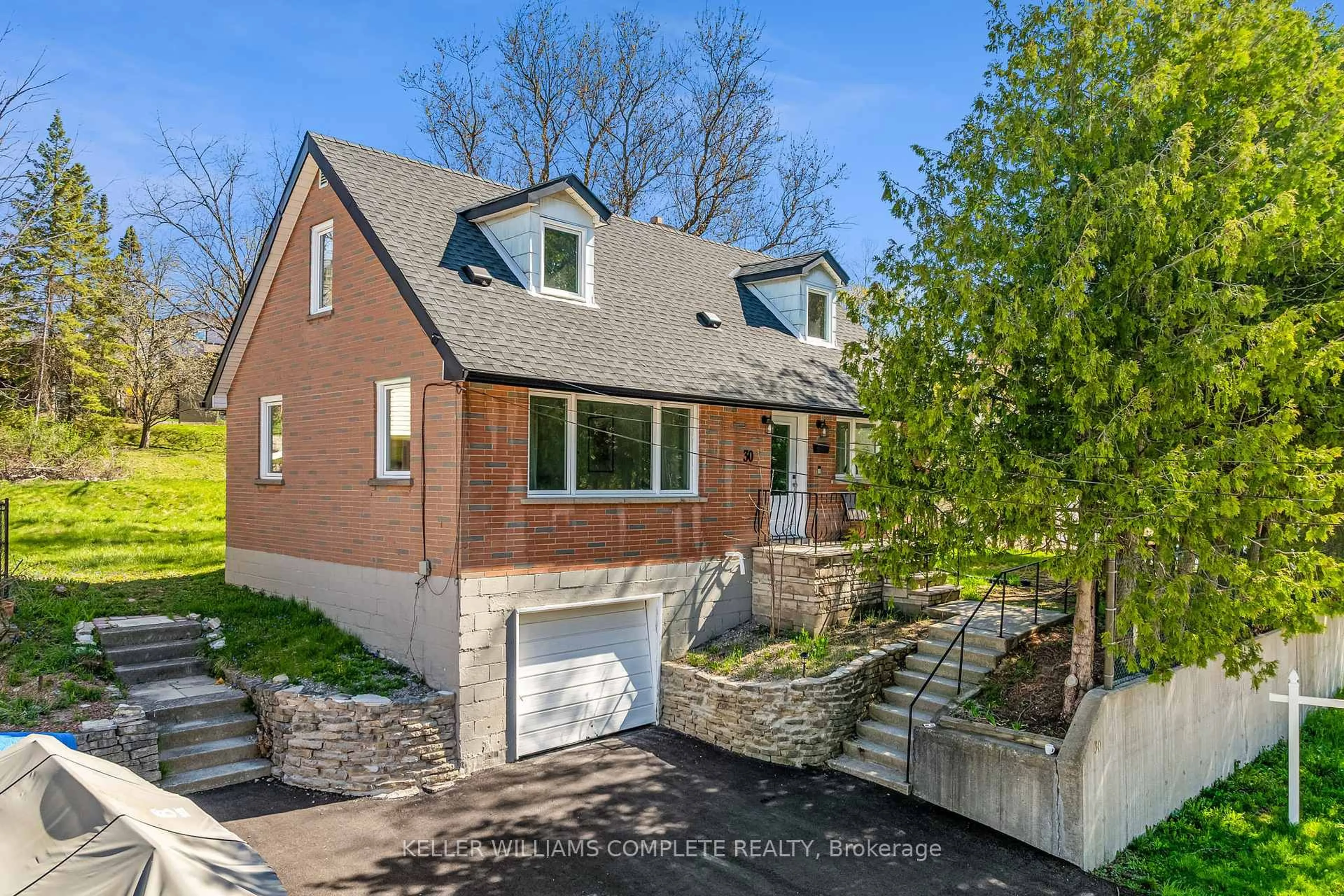 Home with brick exterior material, street for 30 Ann St, Hamilton Ontario L9H 2N5