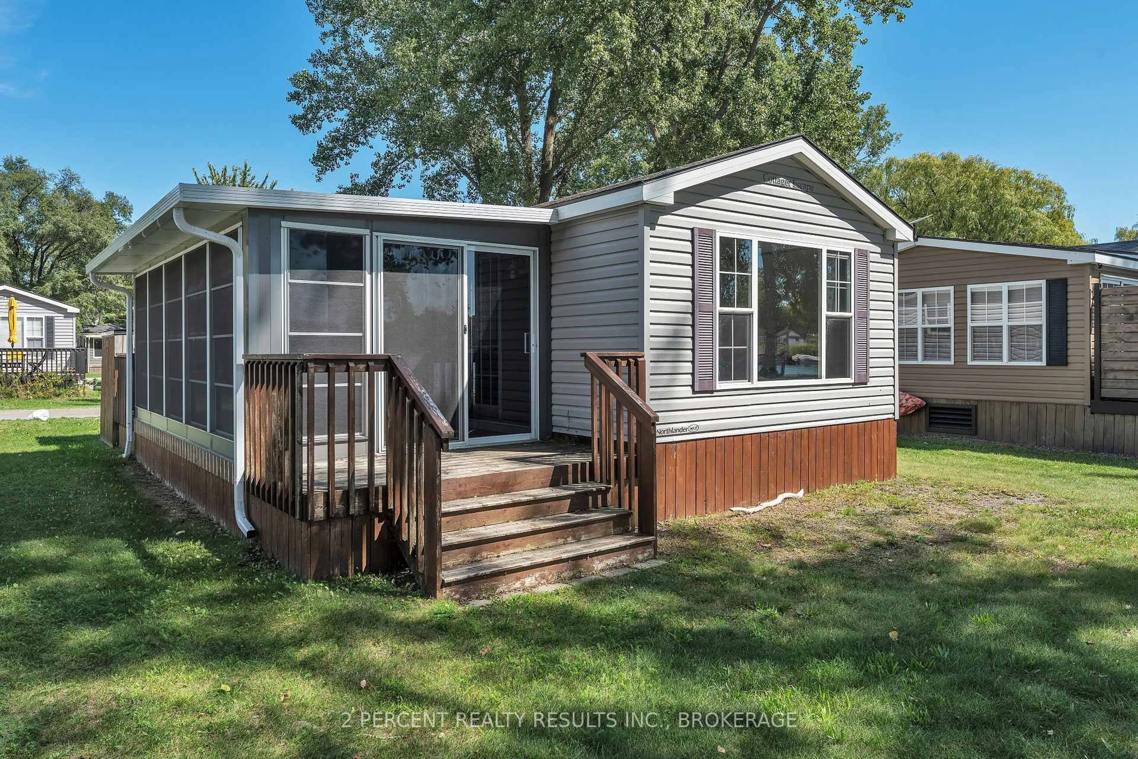 Home with vinyl exterior material, unknown for 486 County Road 18 Rd #BVL023, Prince Edward County Ontario K0K 1P0