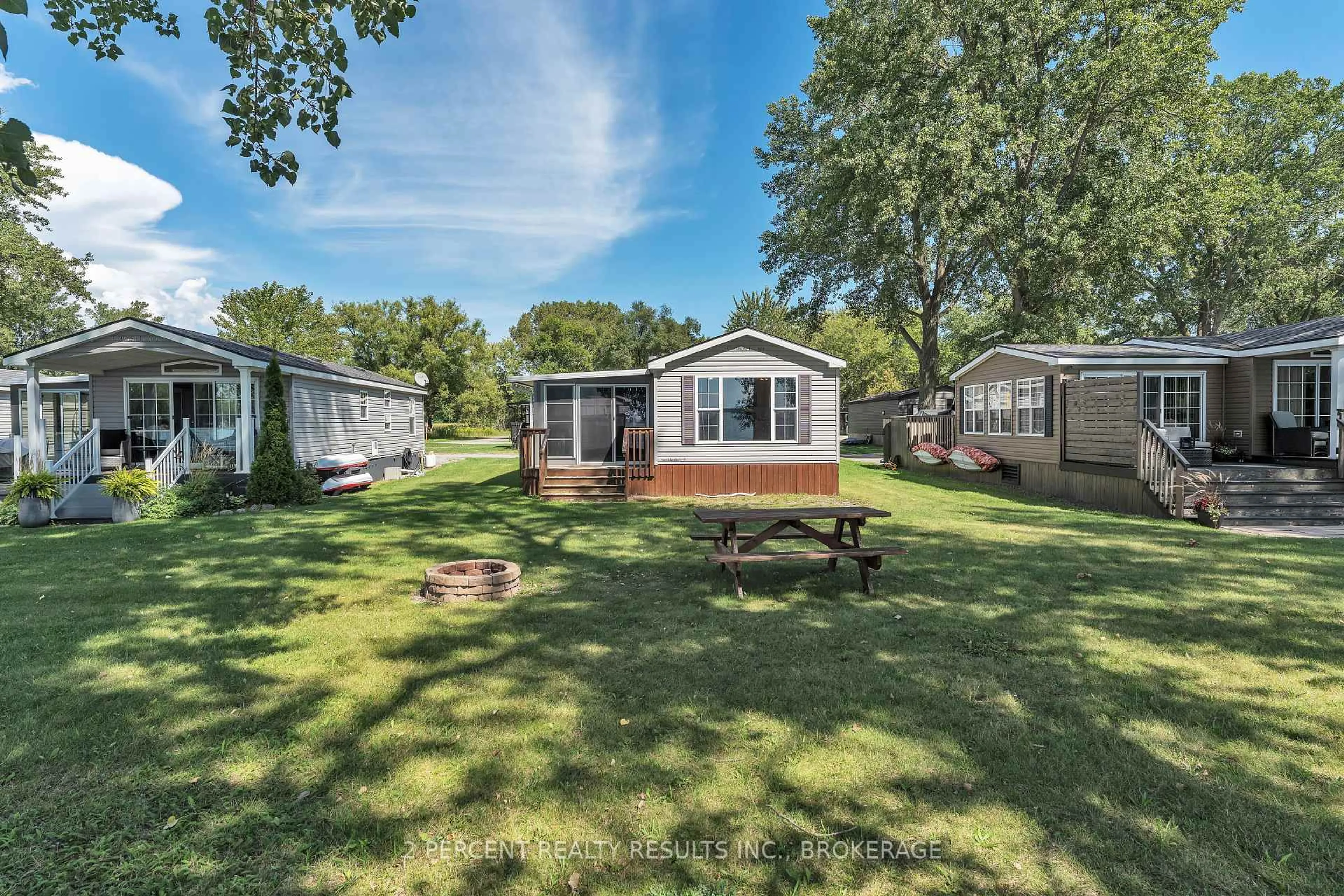 A pic from outside/outdoor area/front of a property/back of a property/a pic from drone, water/lake/river/ocean view for 486 County Road 18 Rd #BVL023, Prince Edward County Ontario K0K 1P0