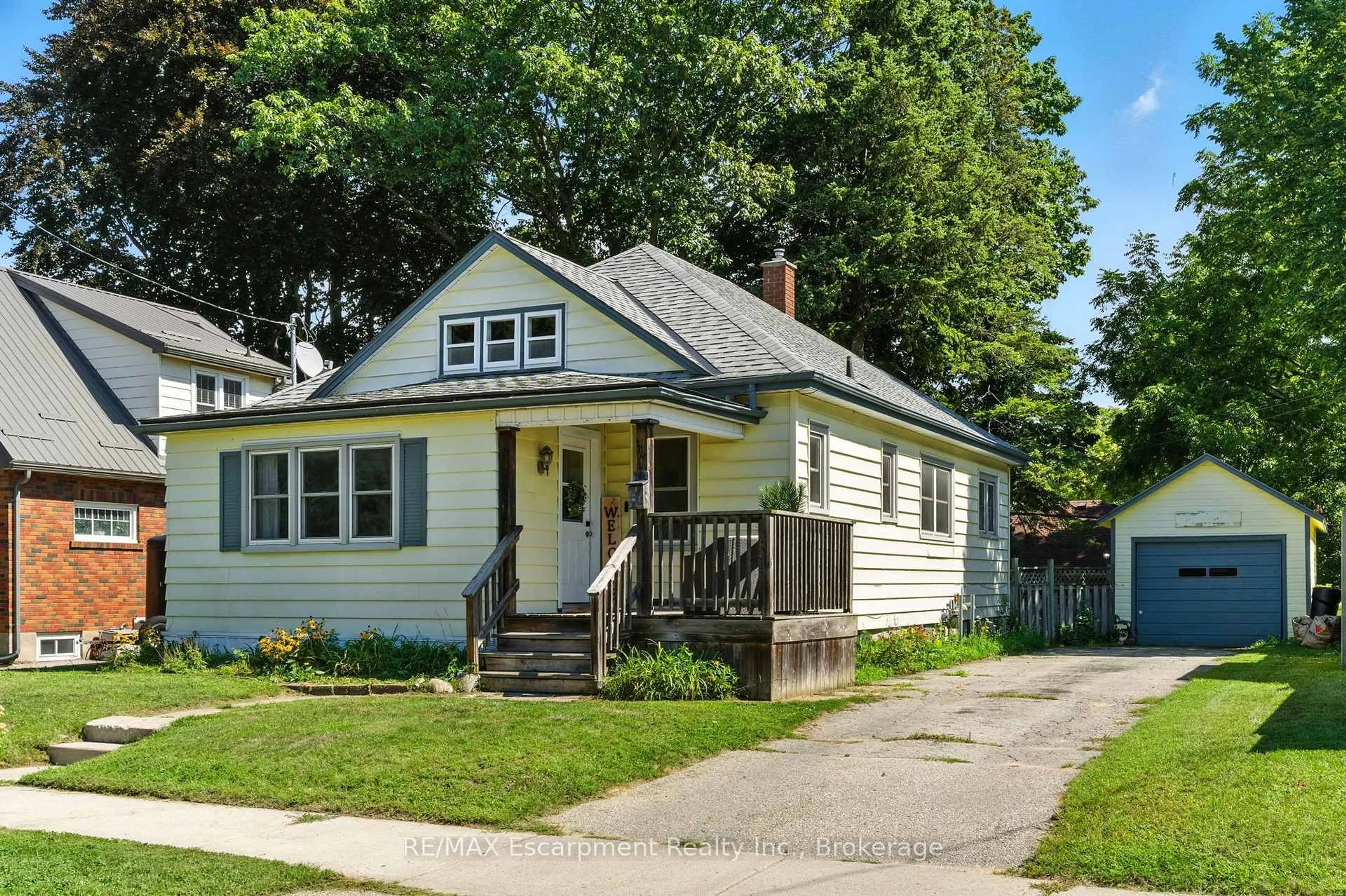 Home with vinyl exterior material, street for 103 Orchard Ave, Norfolk Ontario N3Y 3H3