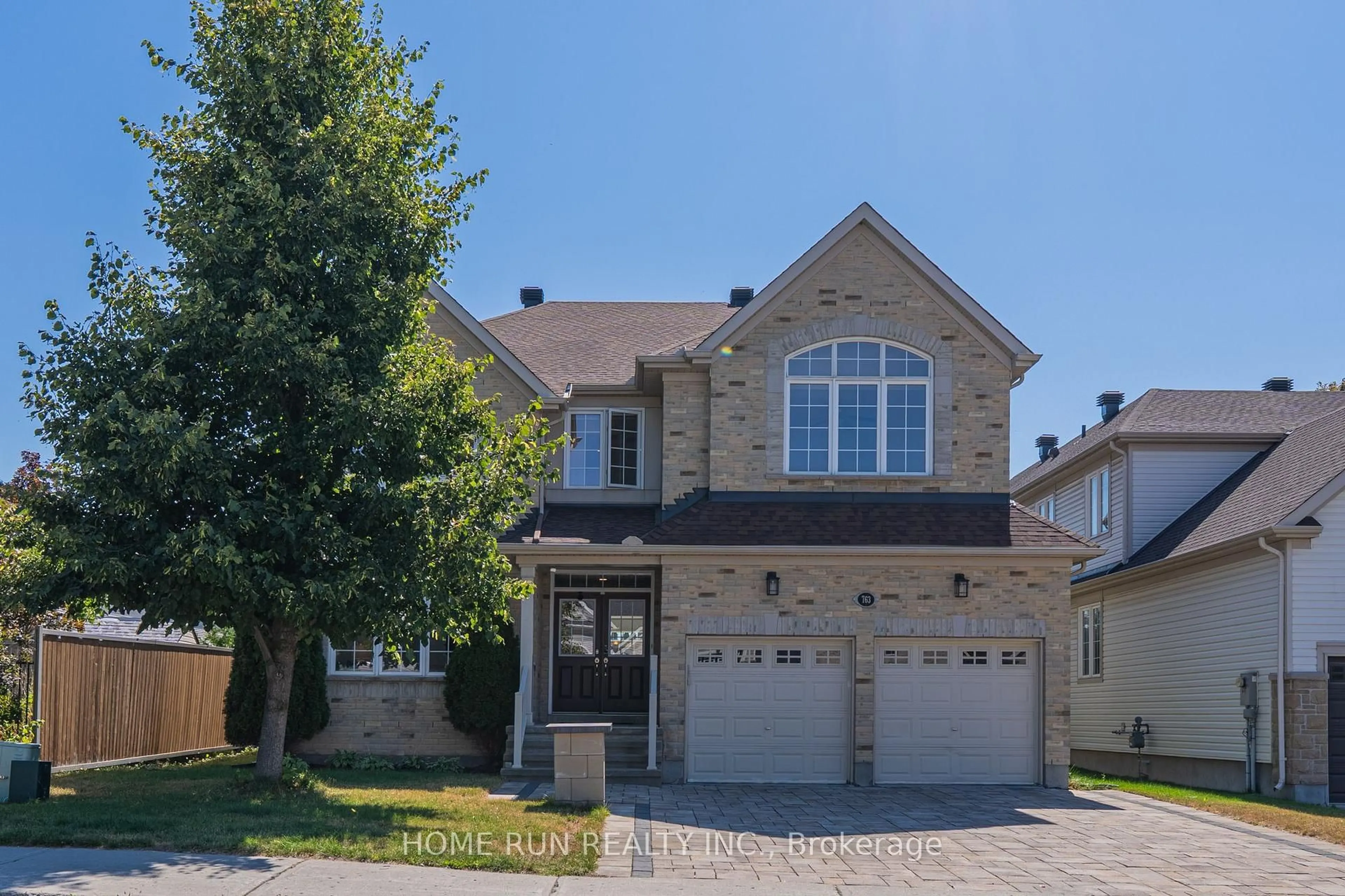 Home with brick exterior material, street for 763 Kilbirnie Dr, Ottawa Ontario K2J 0M2