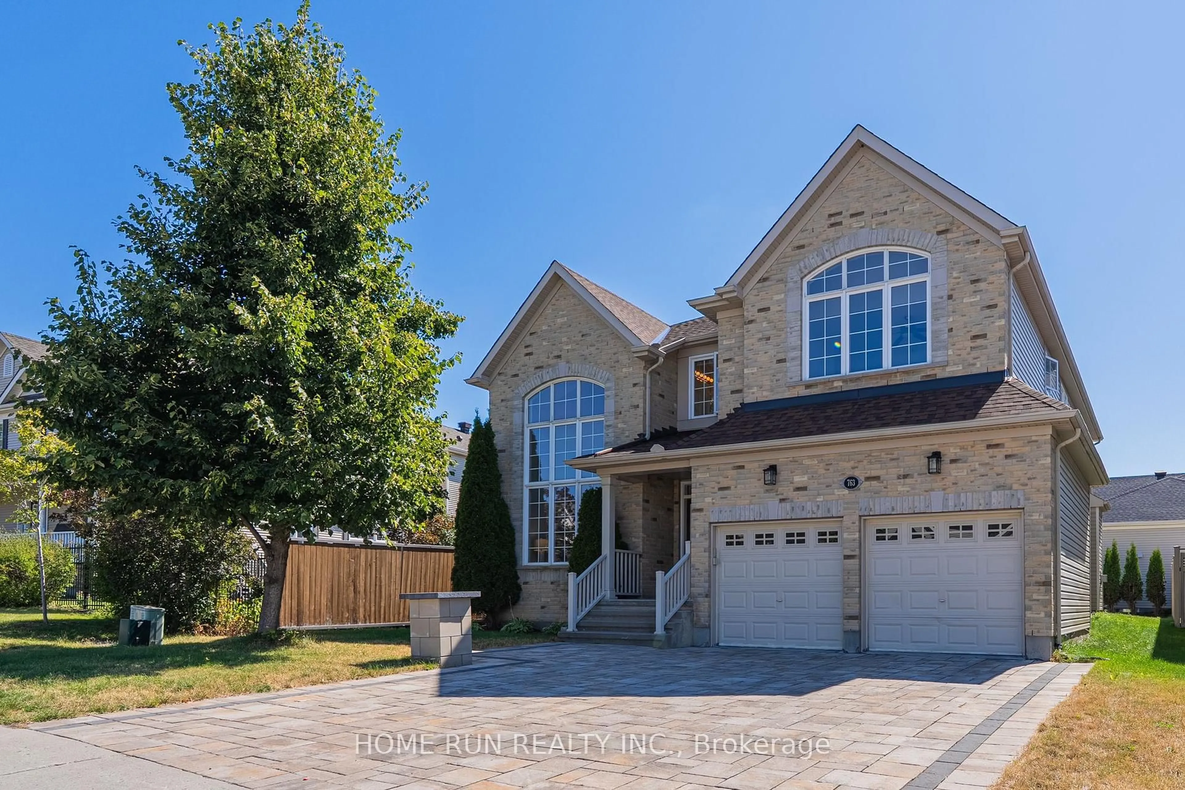 Home with brick exterior material, street for 763 Kilbirnie Dr, Ottawa Ontario K2J 0M2