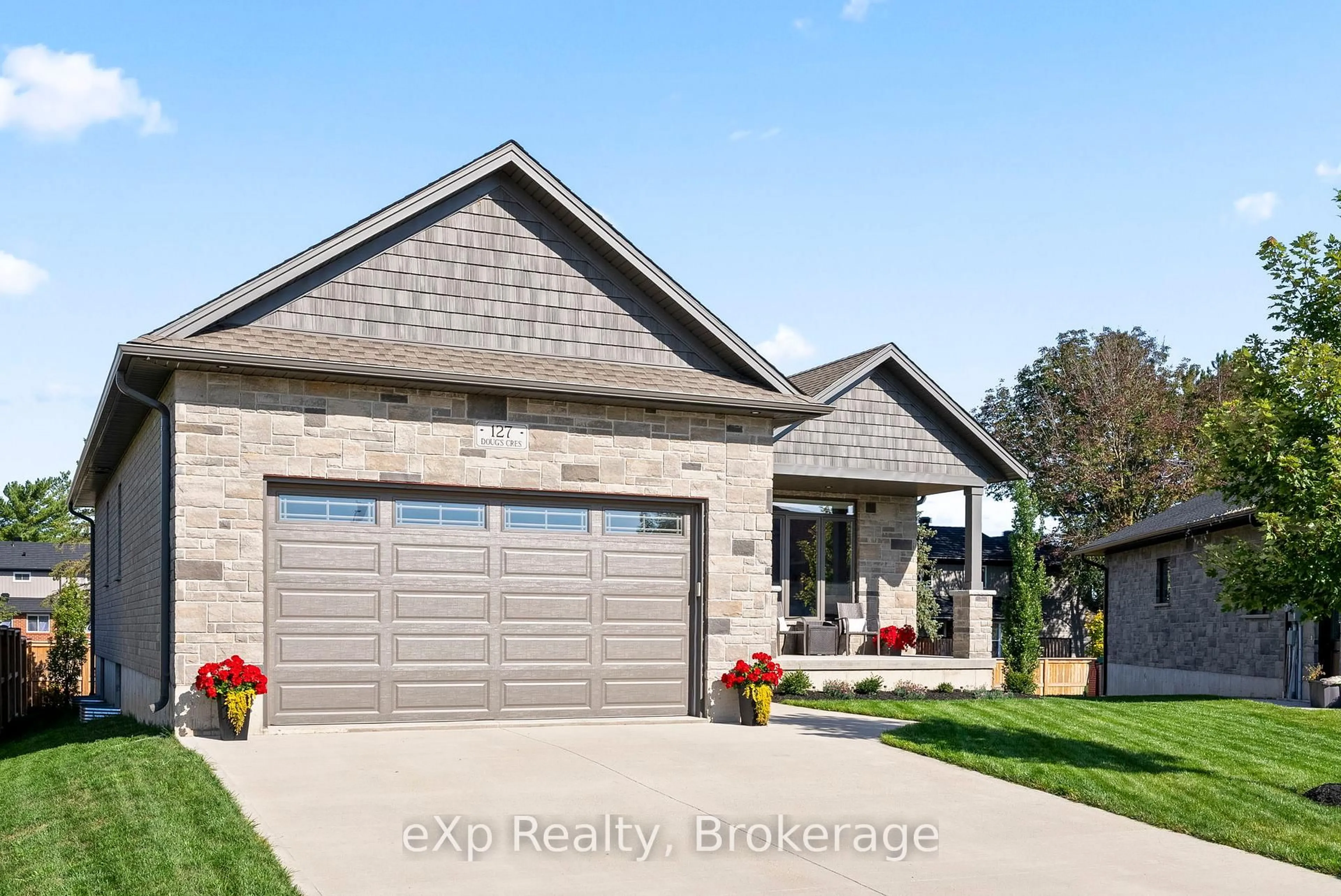 Home with brick exterior material, street for 127 DOUG'S Cres, Wellington North Ontario N0G 2L4