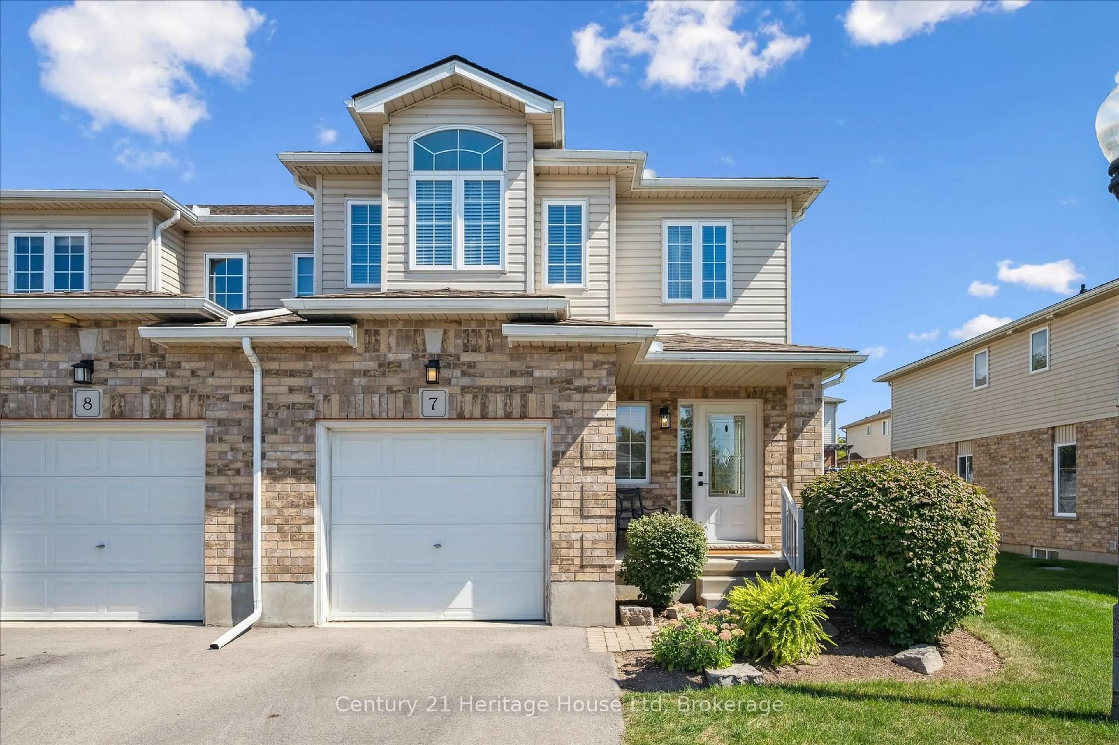 Home with brick exterior material, street for 20 Shackleton Dr #7, Guelph Ontario N1E 0C5