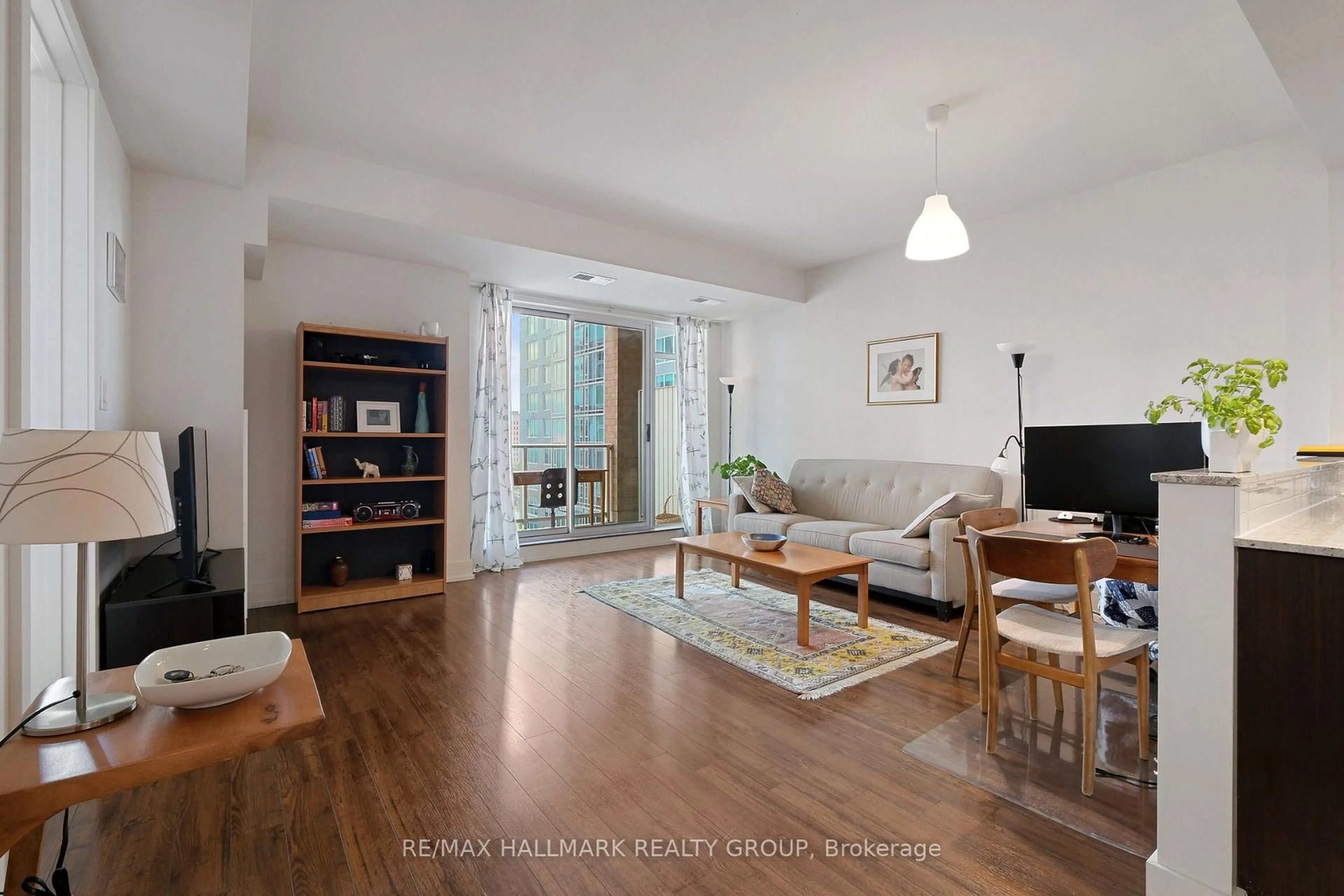 Living room with furniture, unknown for 100 Champagne Ave #706, Ottawa Ontario K1S 4P4