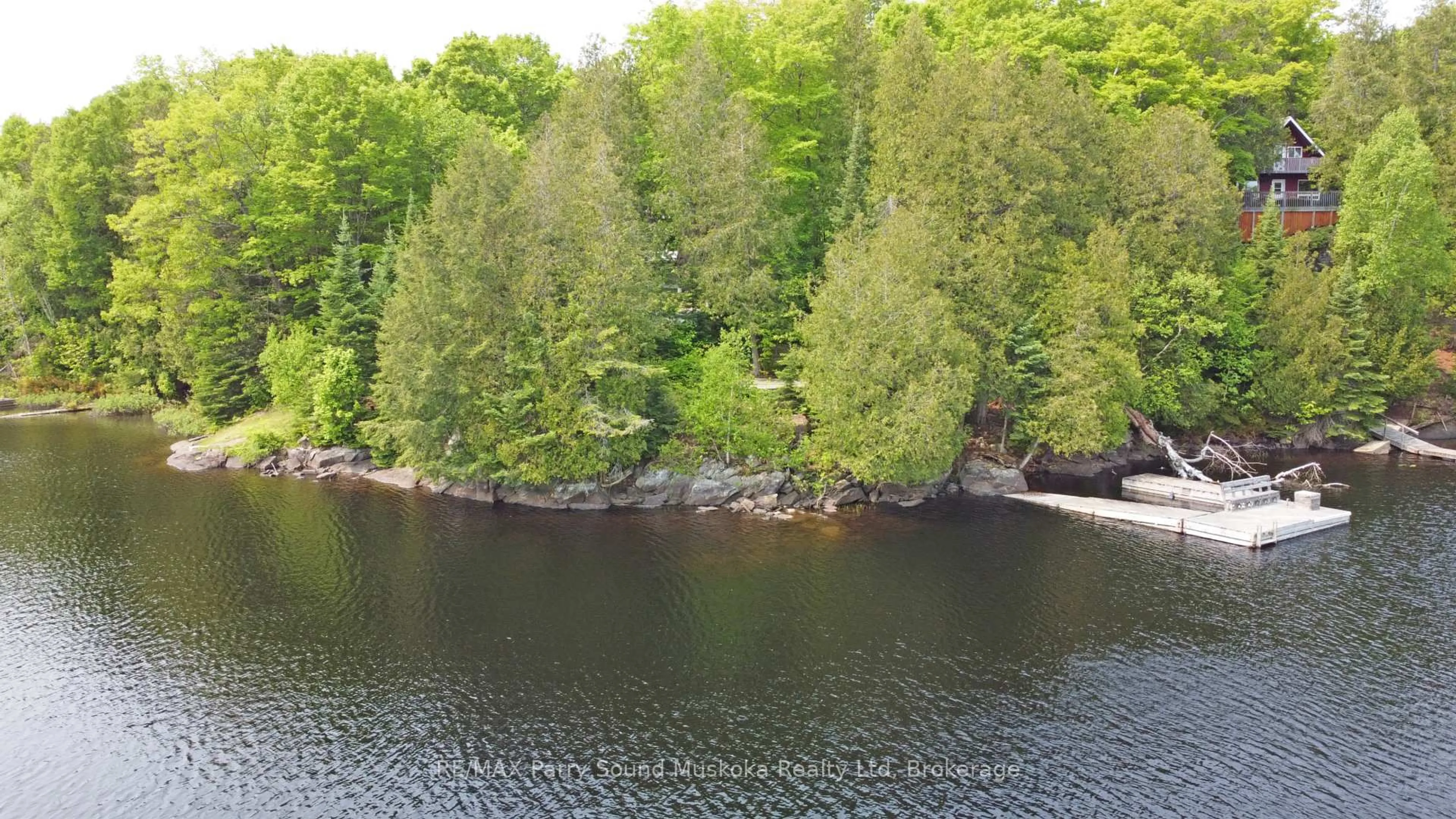 A pic from outside/outdoor area/front of a property/back of a property/a pic from drone, water/lake/river/ocean view for 84 Captain Estates Rd, Whitestone Ontario P0A 1G0