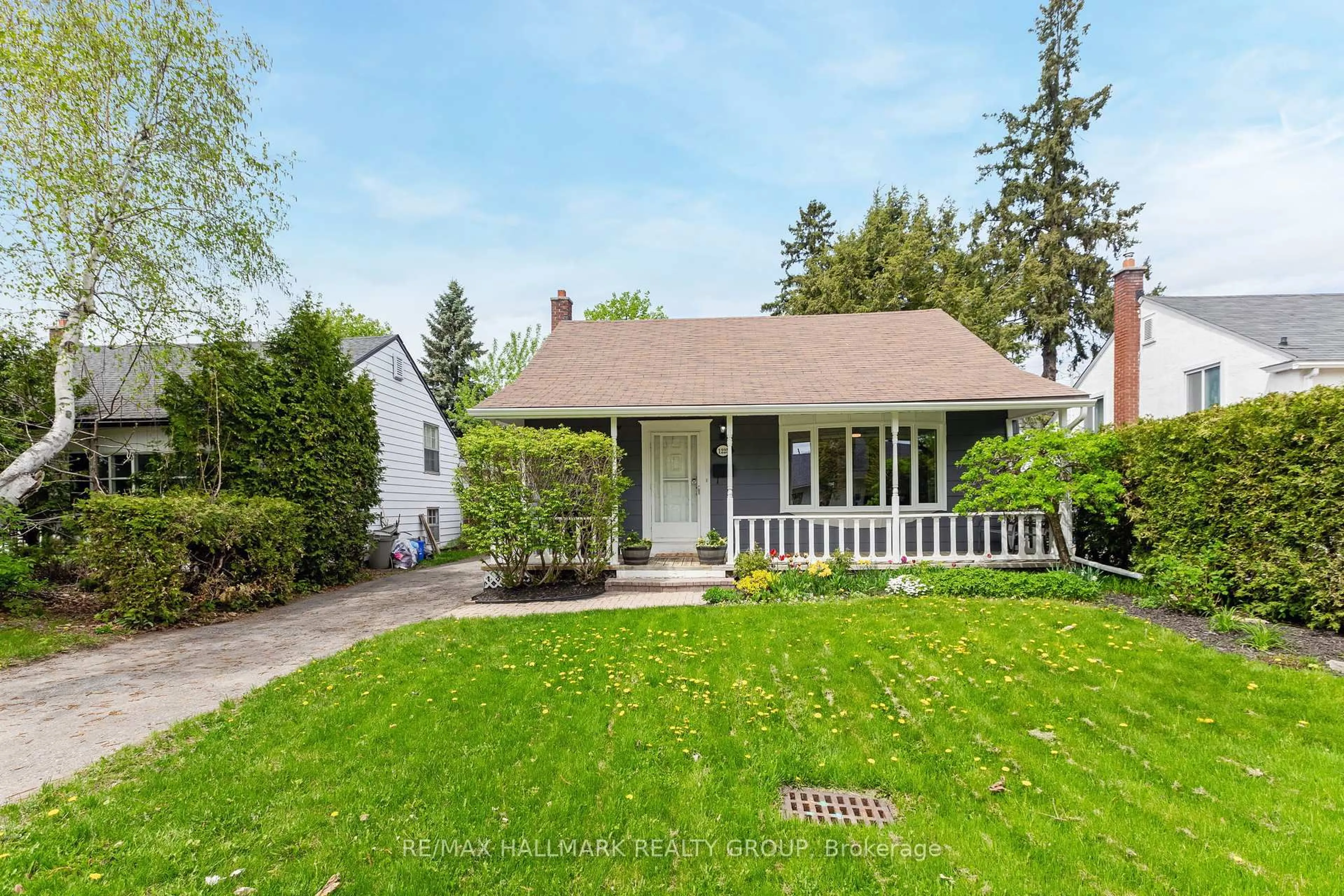 Home with vinyl exterior material, street for 1225 Foxbar Ave, Ottawa Ontario K1V 6V4