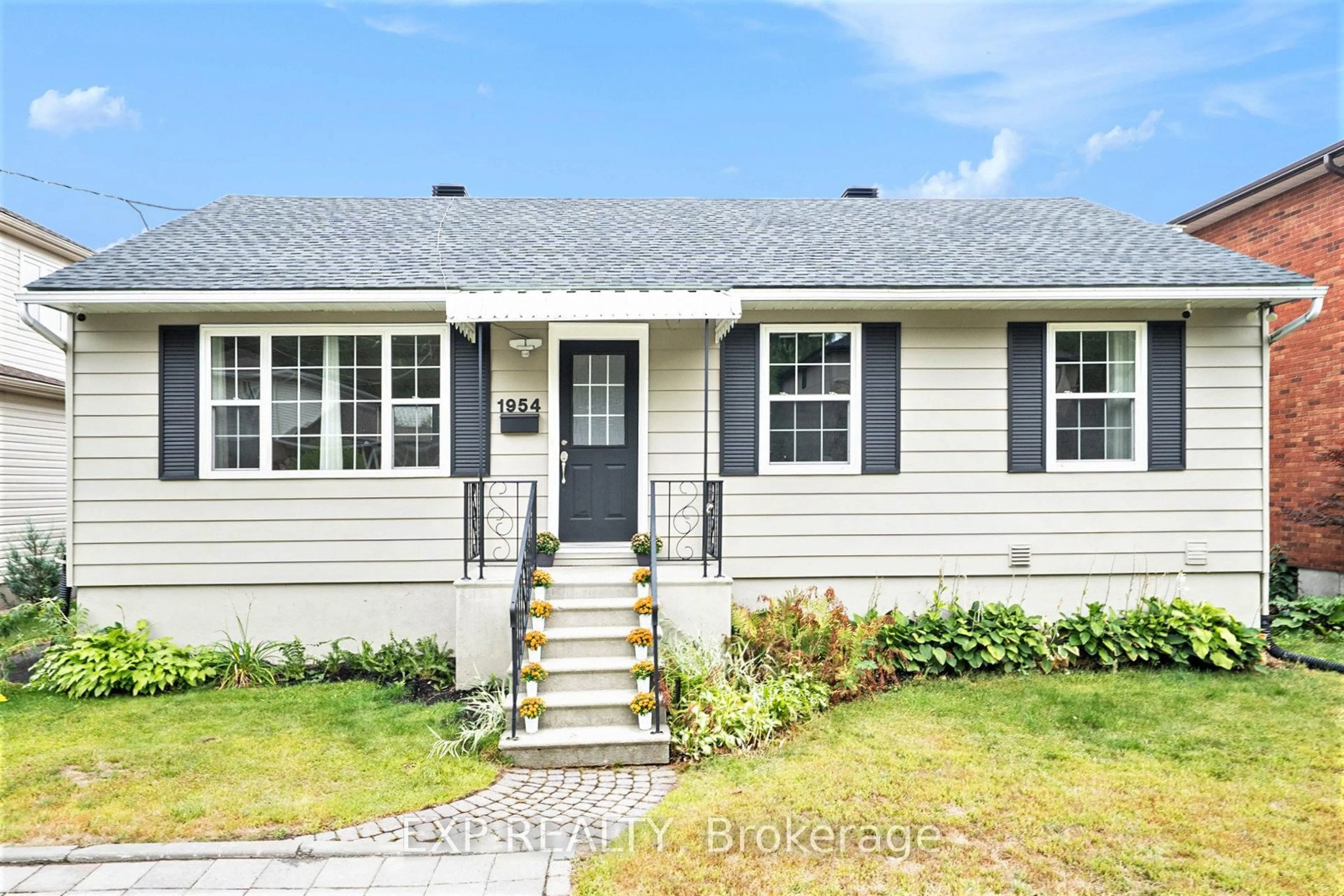Home with vinyl exterior material, street for 1954 Rosebella Ave, Ottawa Ontario K1T 1G7