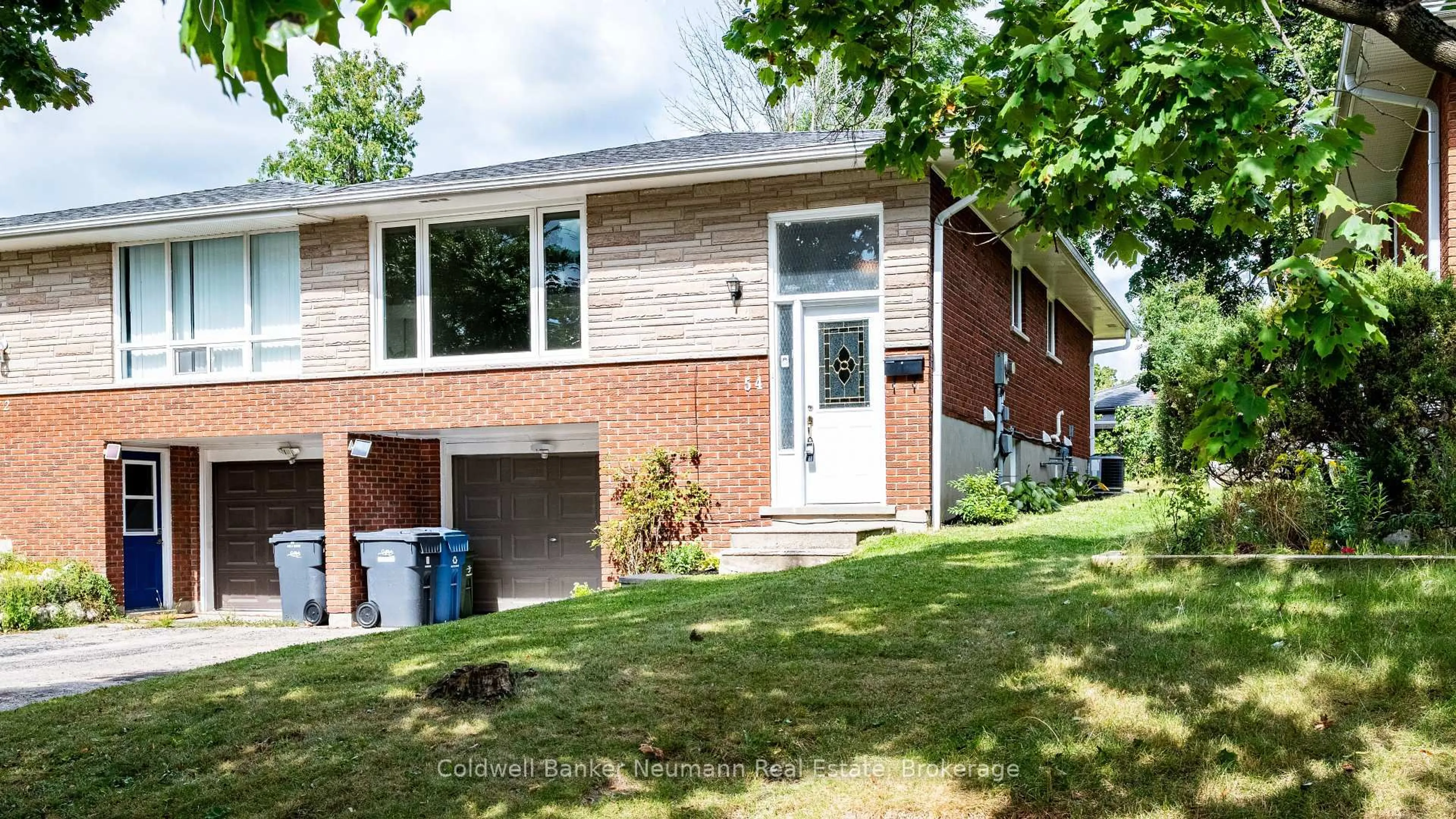 Home with brick exterior material, street for 54 Conroy Cres, Guelph Ontario N1G 2V6
