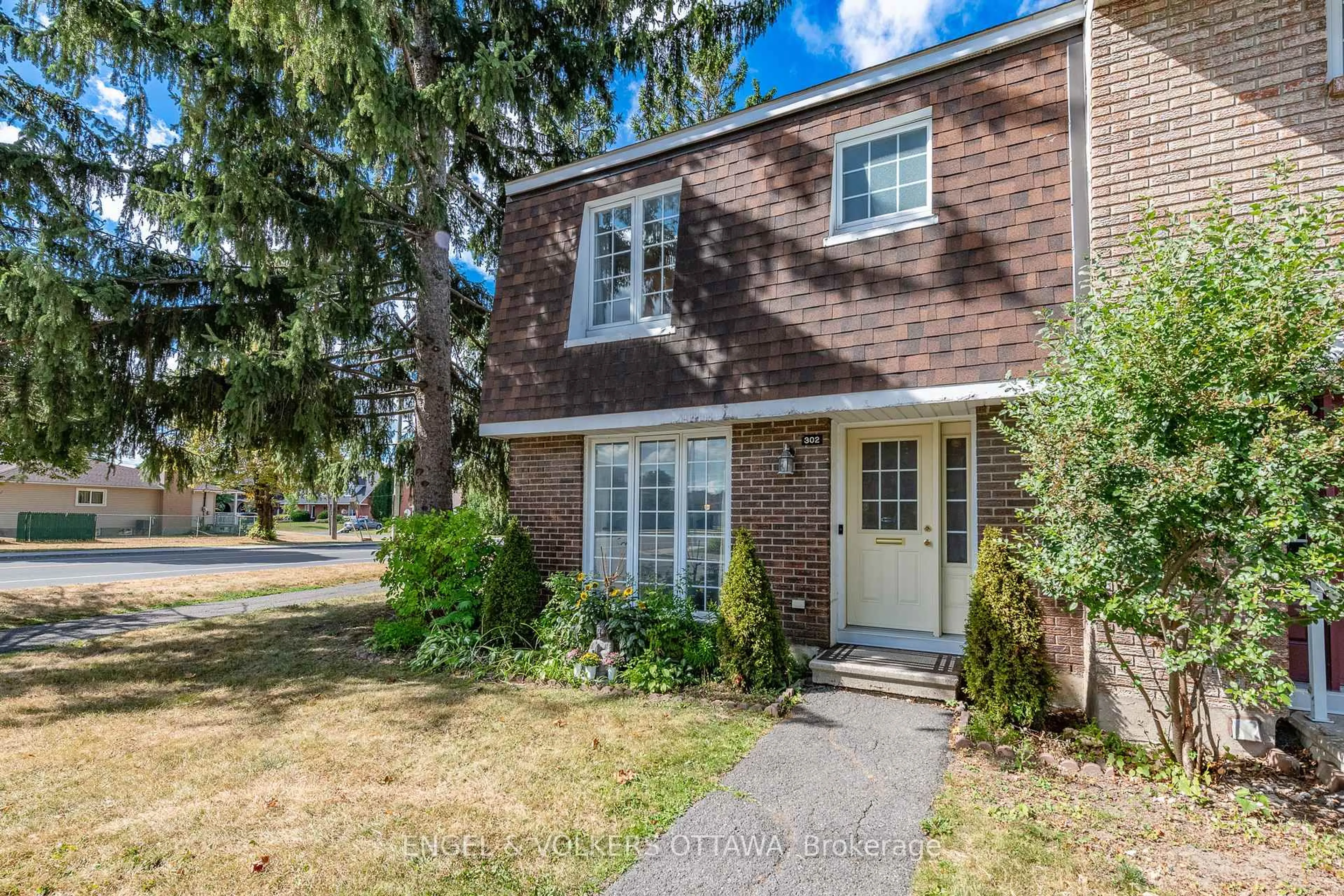 Home with brick exterior material, street for 302 Kintyre Private #105, Ottawa Ontario K2C 3M6