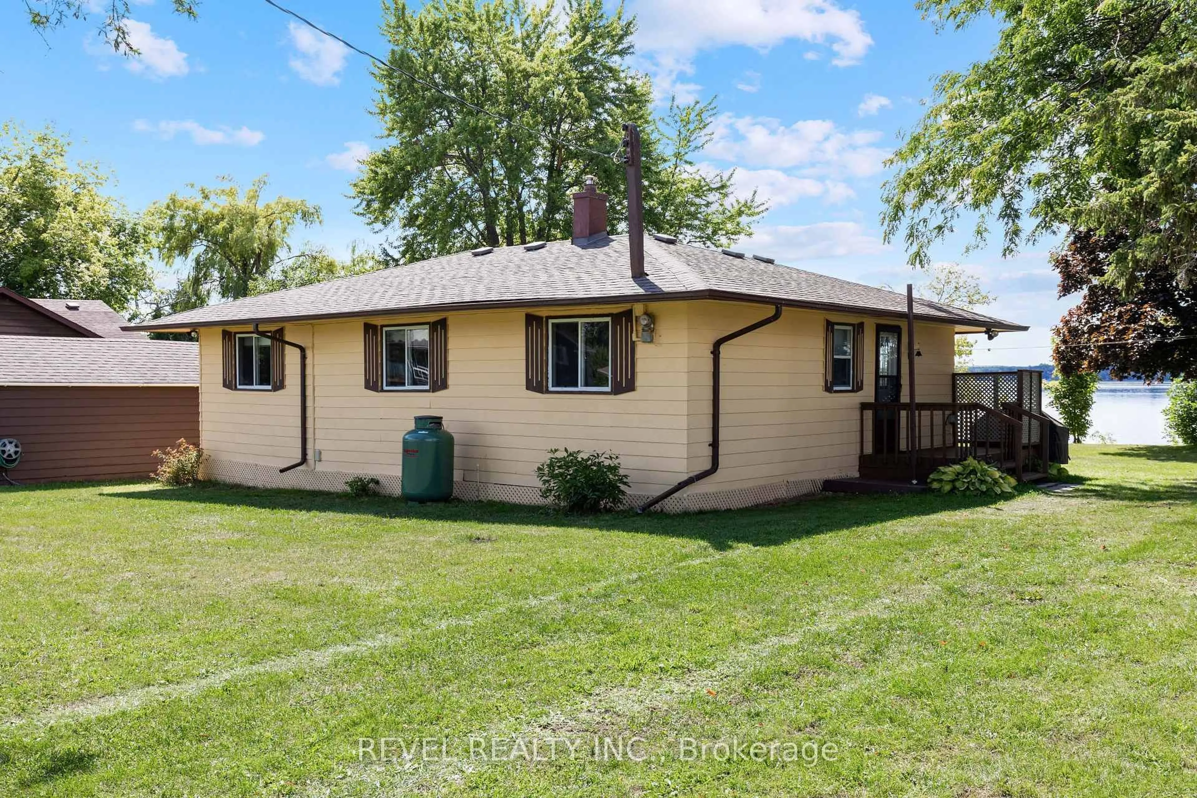 Home with vinyl exterior material, street for 144 Starr Blvd, Kawartha Lakes Ontario K0M 2C0