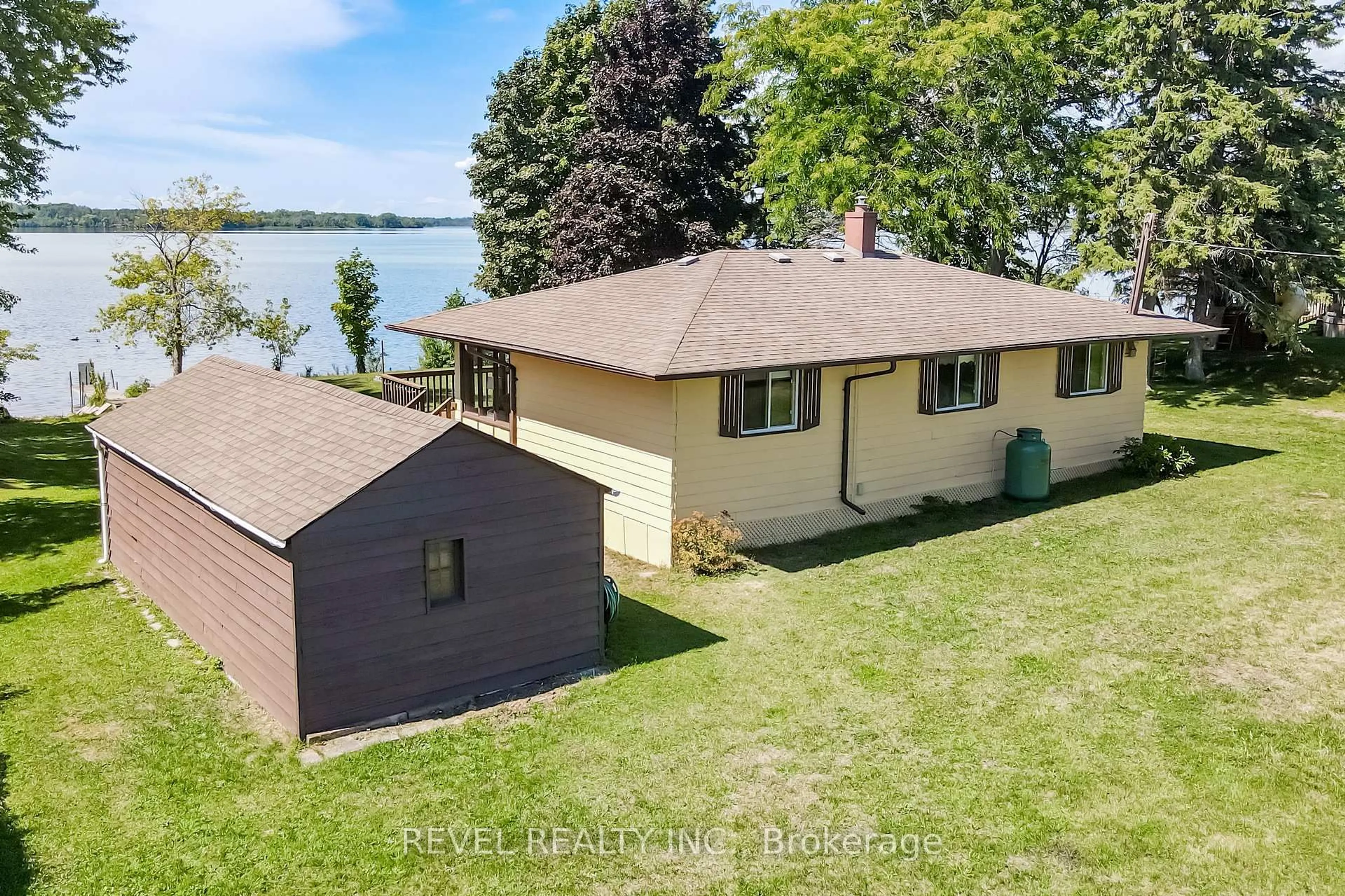 A pic from outside/outdoor area/front of a property/back of a property/a pic from drone, water/lake/river/ocean view for 144 Starr Blvd, Kawartha Lakes Ontario K0M 2C0