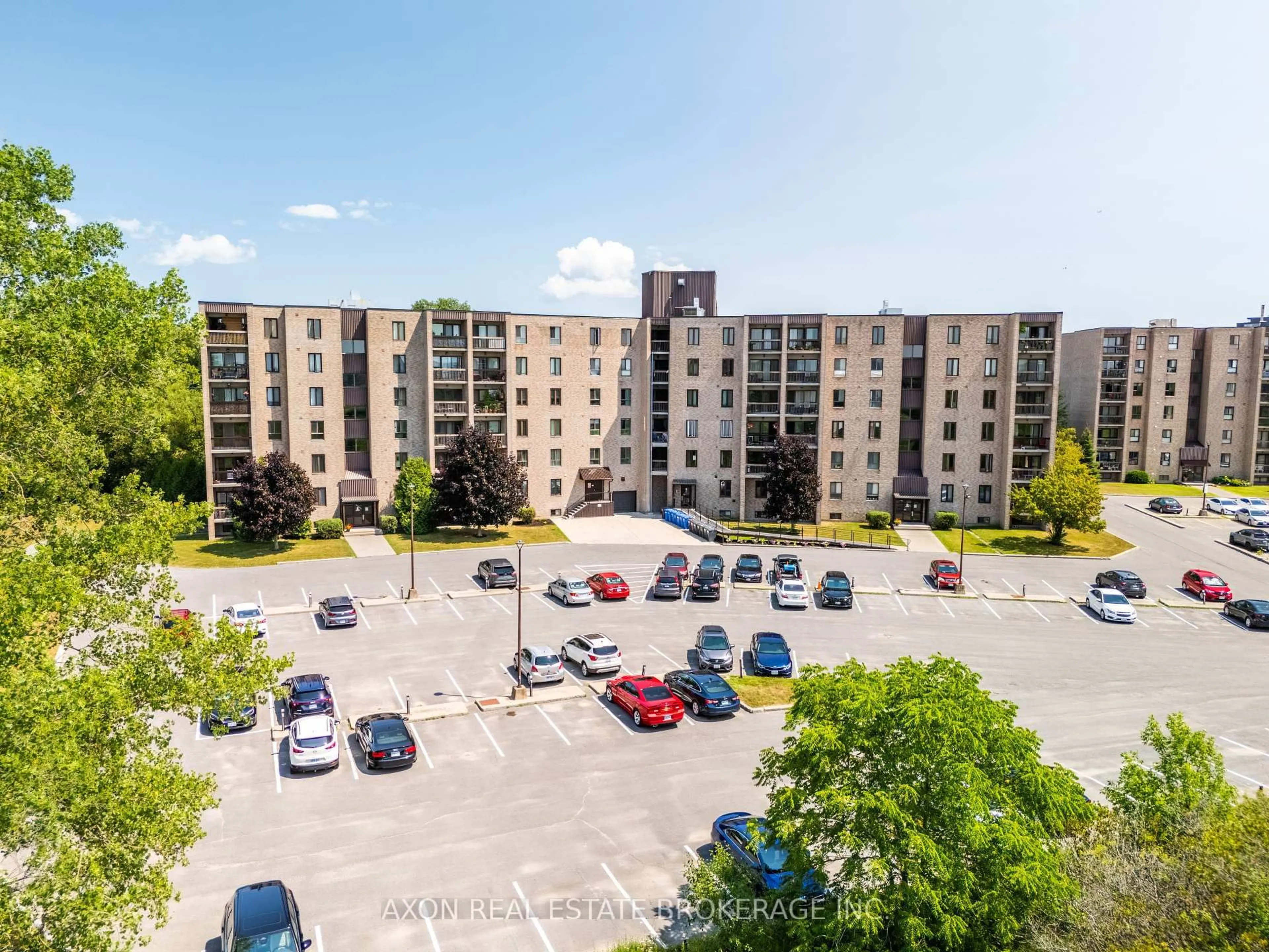 A pic from outside/outdoor area/front of a property/back of a property/a pic from drone, unknown for 358 Queen Mary Rd #501, Kingston Ontario K7M 7E8