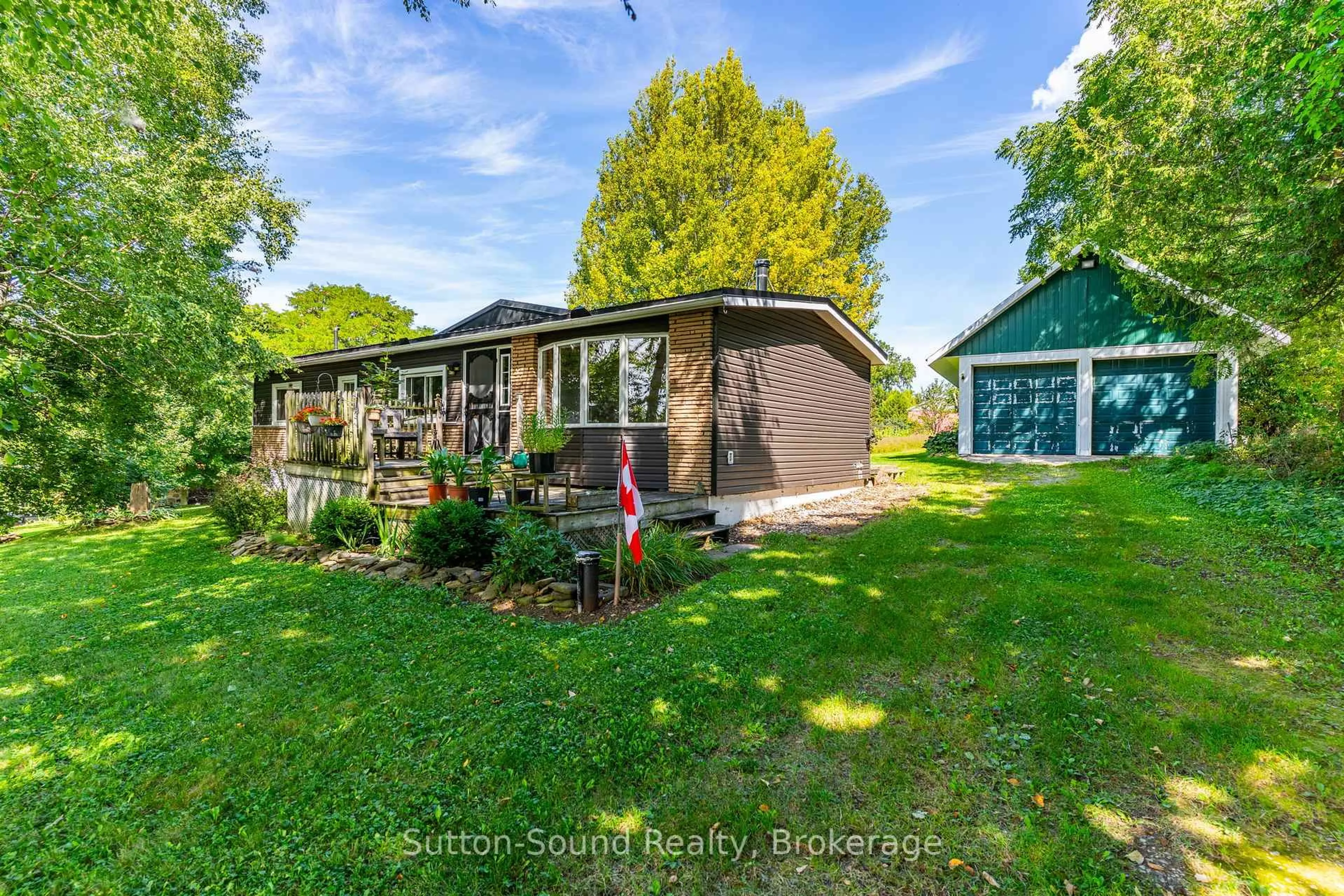 A pic from outside/outdoor area/front of a property/back of a property/a pic from drone, water/lake/river/ocean view for 403261 8 Sdrd, Meaford Ontario N0H 1B0