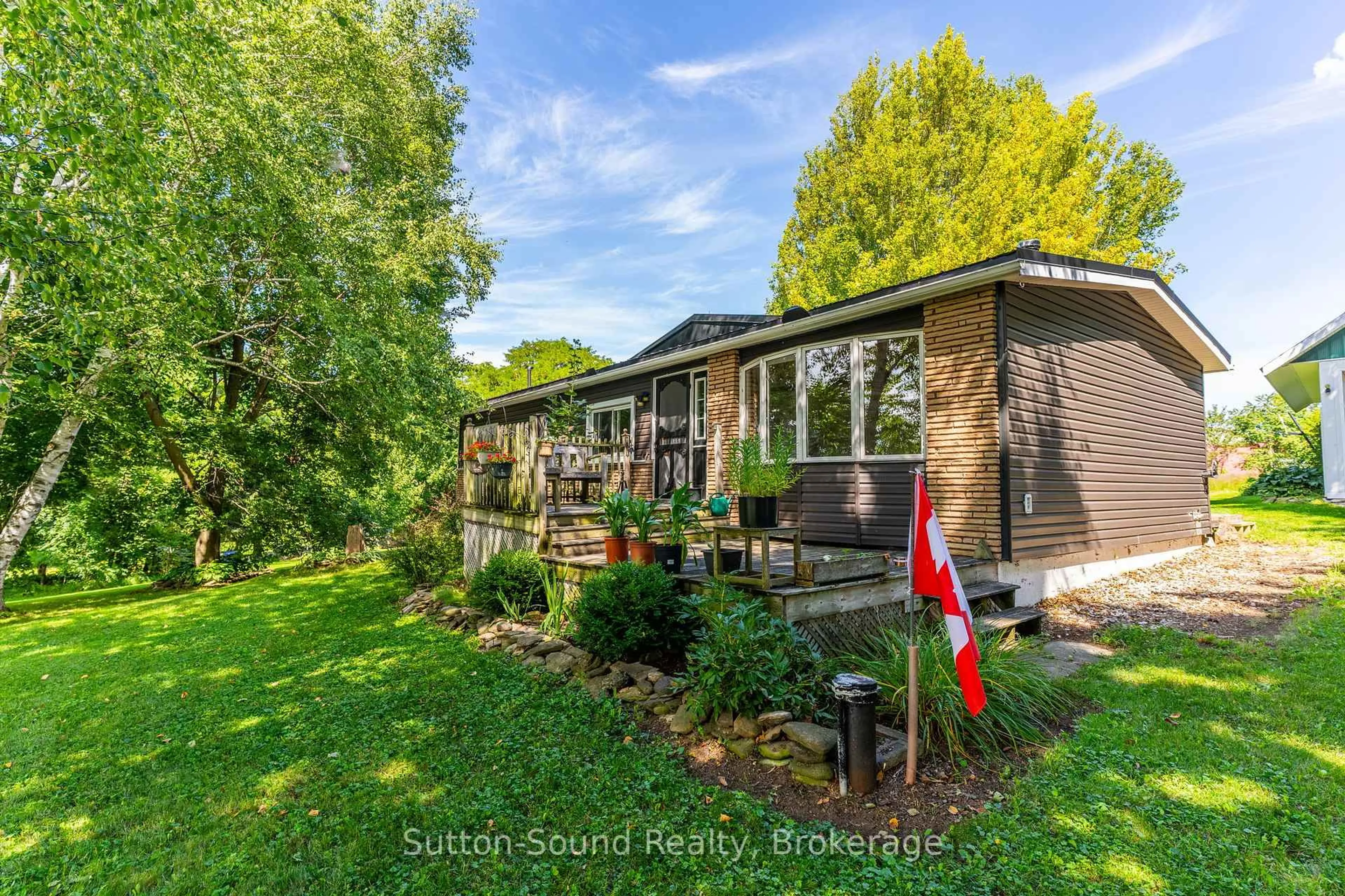 A pic from outside/outdoor area/front of a property/back of a property/a pic from drone, street for 403261 8 Sdrd, Meaford Ontario N0H 1B0