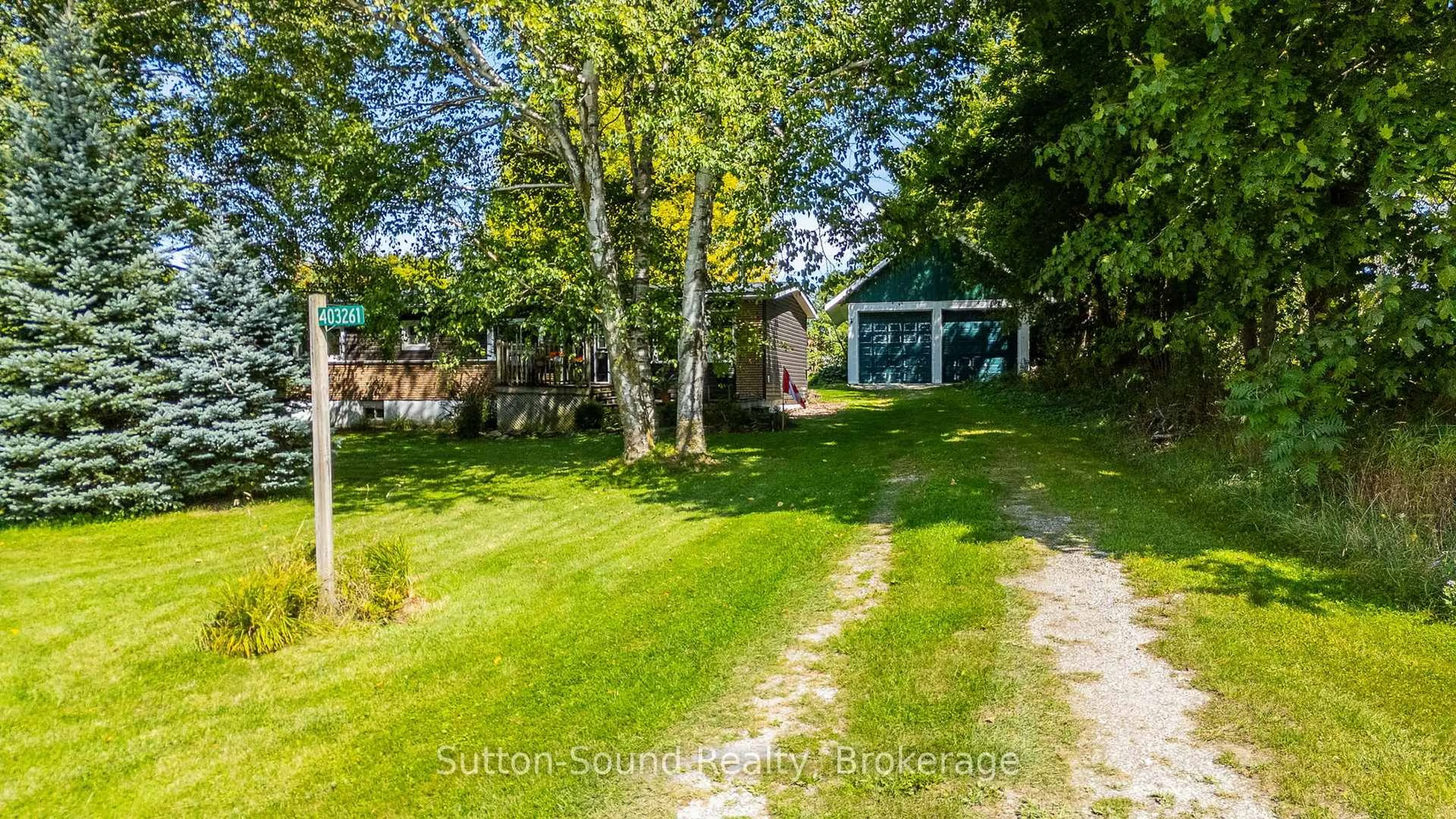 A pic from outside/outdoor area/front of a property/back of a property/a pic from drone, unknown for 403261 8 Sdrd, Meaford Ontario N0H 1B0