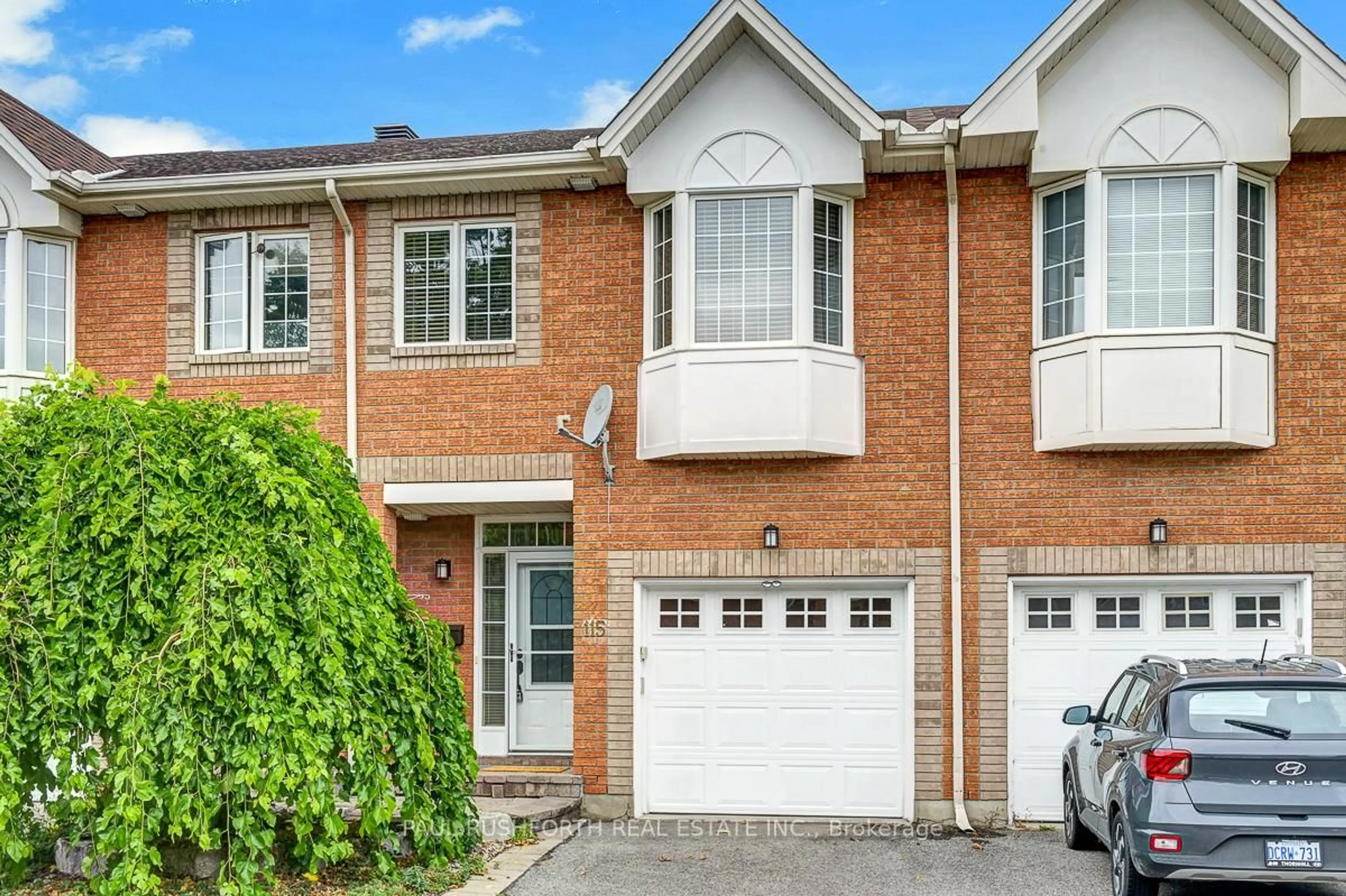 Home with brick exterior material, street for 115 Tall Oak Private, Ottawa Ontario K1G 6T3
