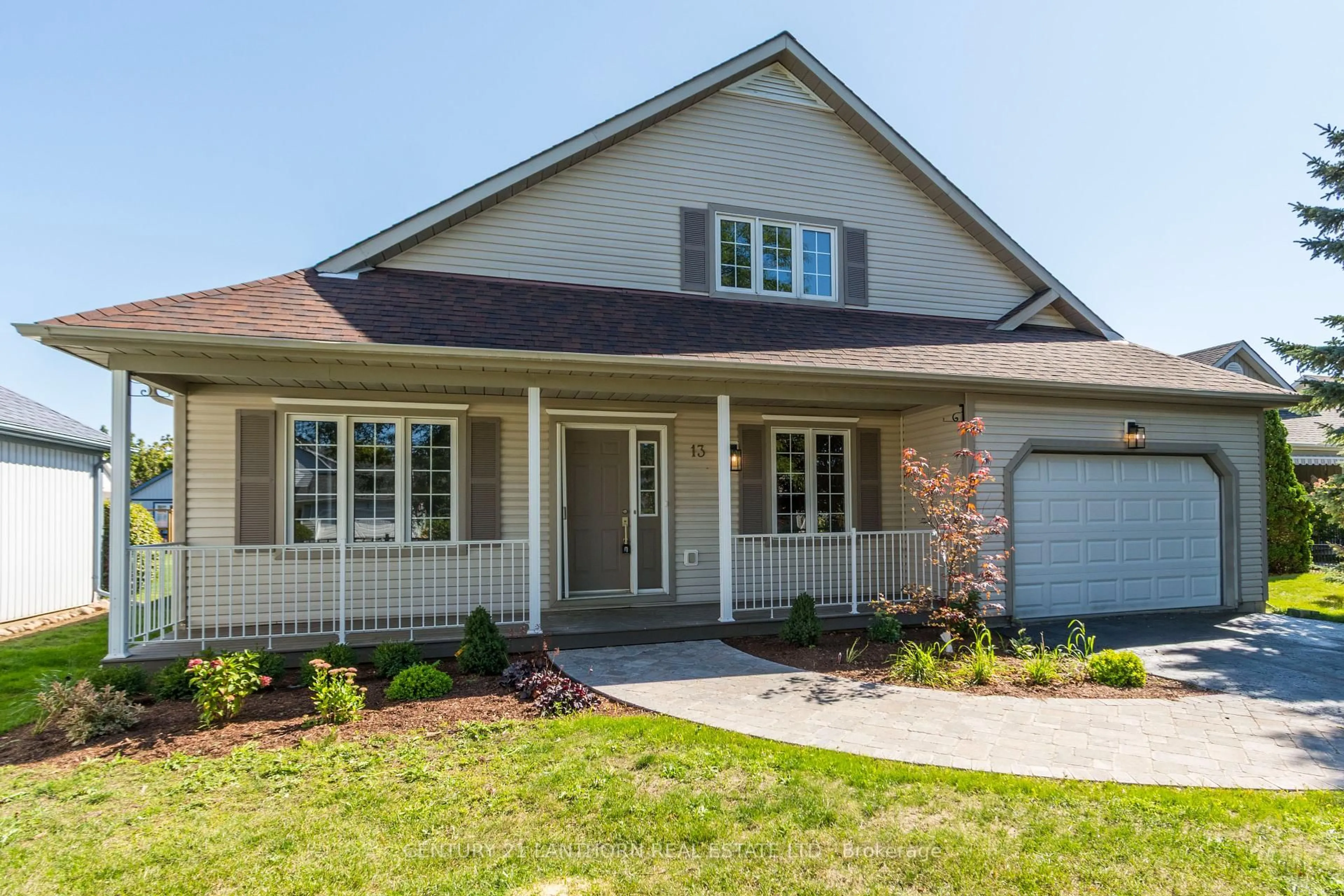 Home with vinyl exterior material, street for 13 Nesbitt Dr, Brighton Ontario K0K 1H0