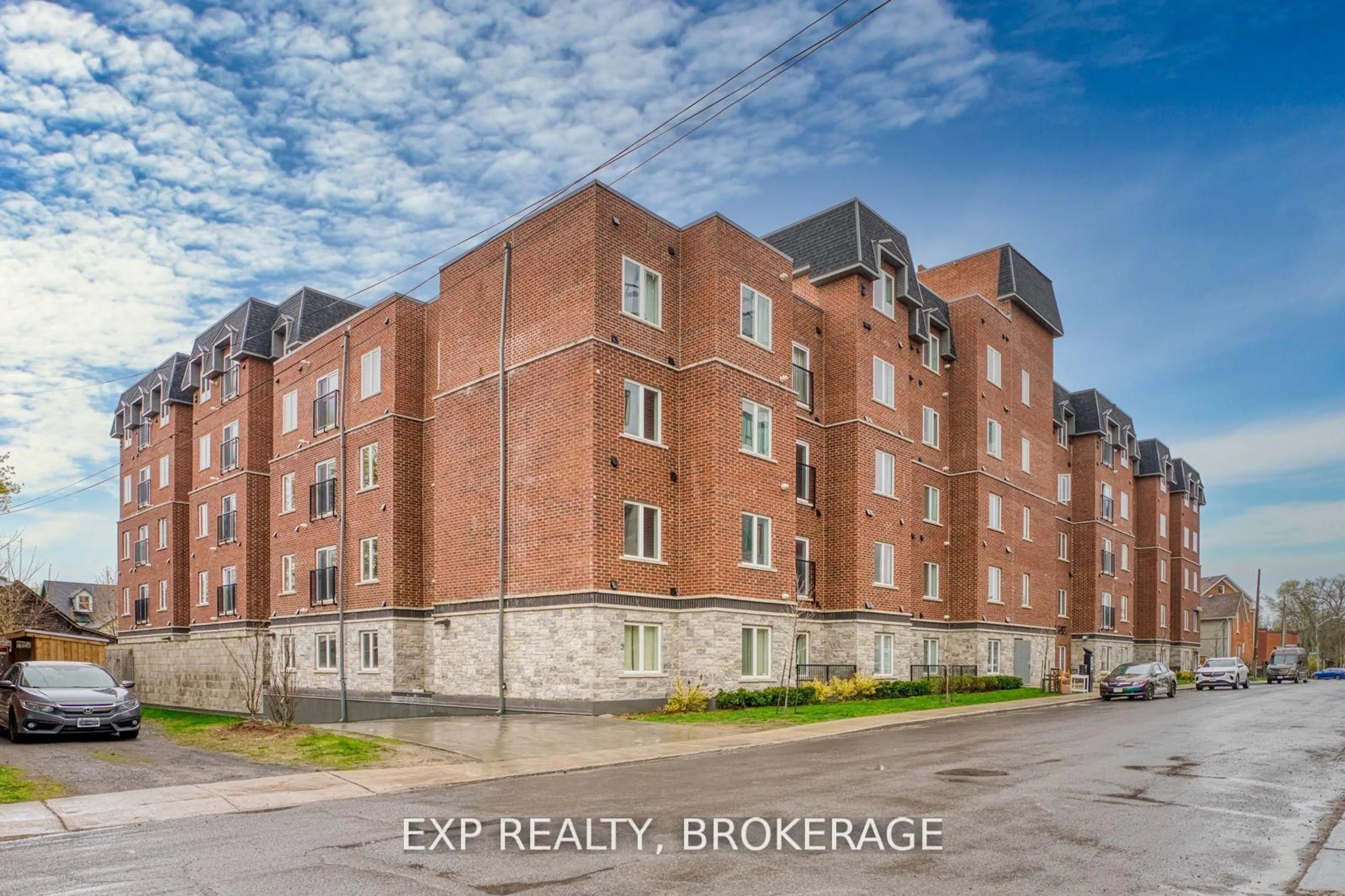 A pic from outside/outdoor area/front of a property/back of a property/a pic from drone, building for 501 Frontenac St #405, Kingston Ontario K7K 4L9