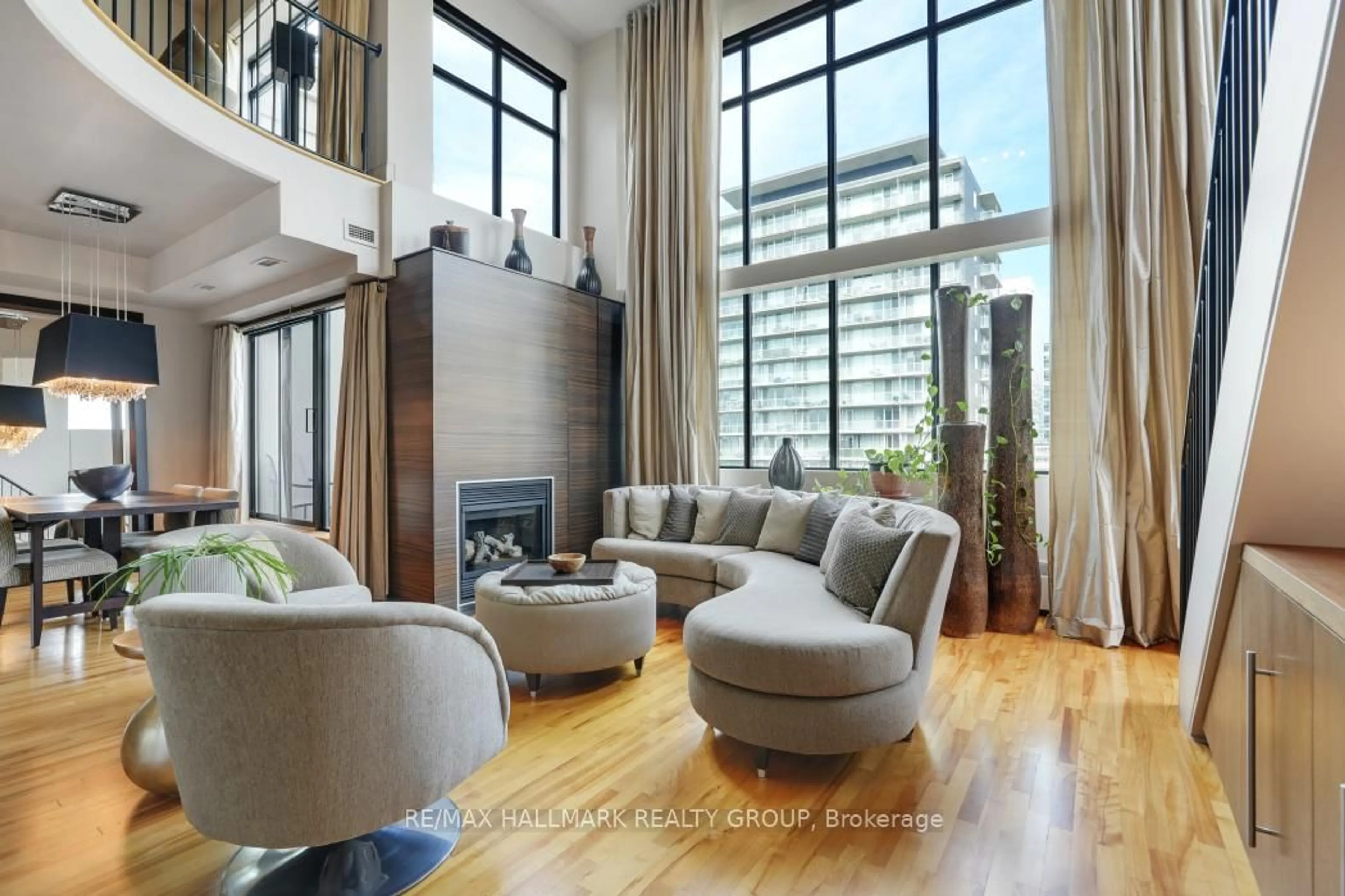 Living room with furniture, unknown for 364 Cooper St #PH2, Ottawa Ontario K2P 2P3