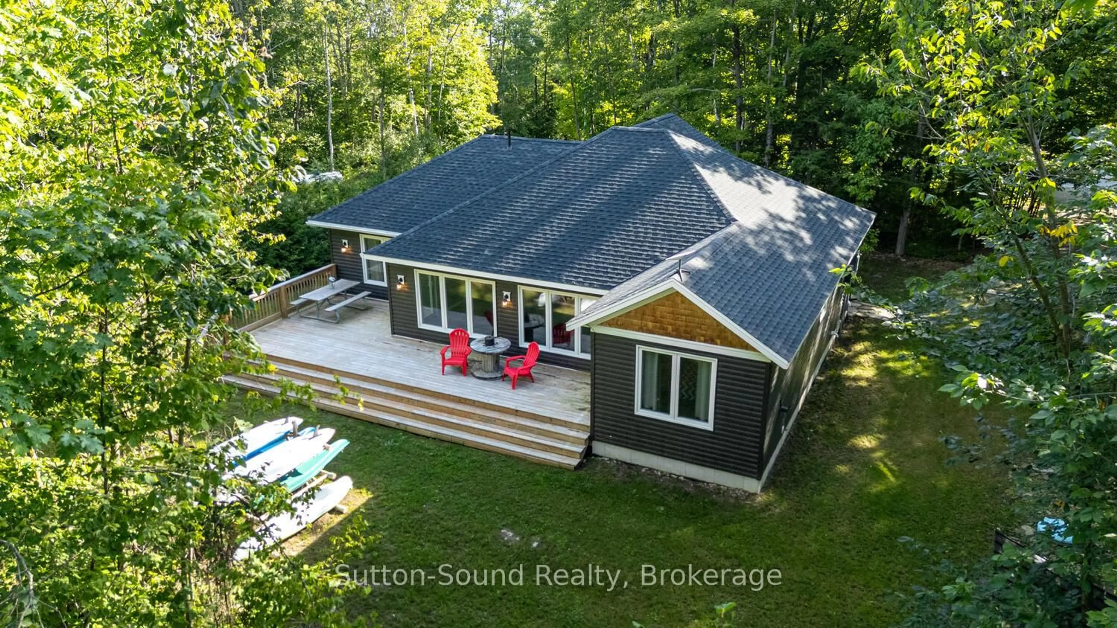 A pic from outside/outdoor area/front of a property/back of a property/a pic from drone, water/lake/river/ocean view for 504760 Grey Road 1, Georgian Bluffs Ontario N0H 1S0
