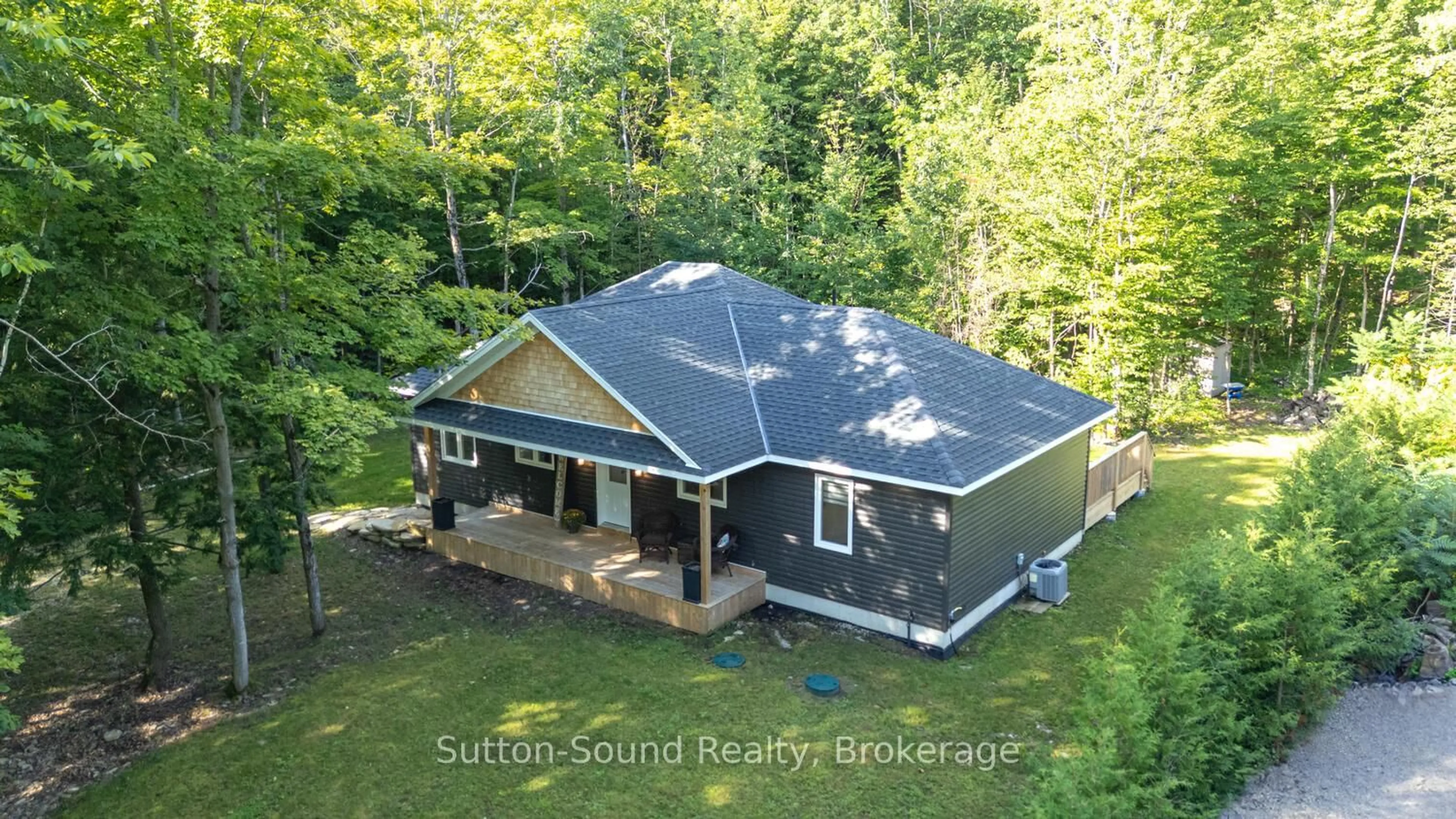 A pic from outside/outdoor area/front of a property/back of a property/a pic from drone, building for 504760 Grey Road 1, Georgian Bluffs Ontario N0H 1S0