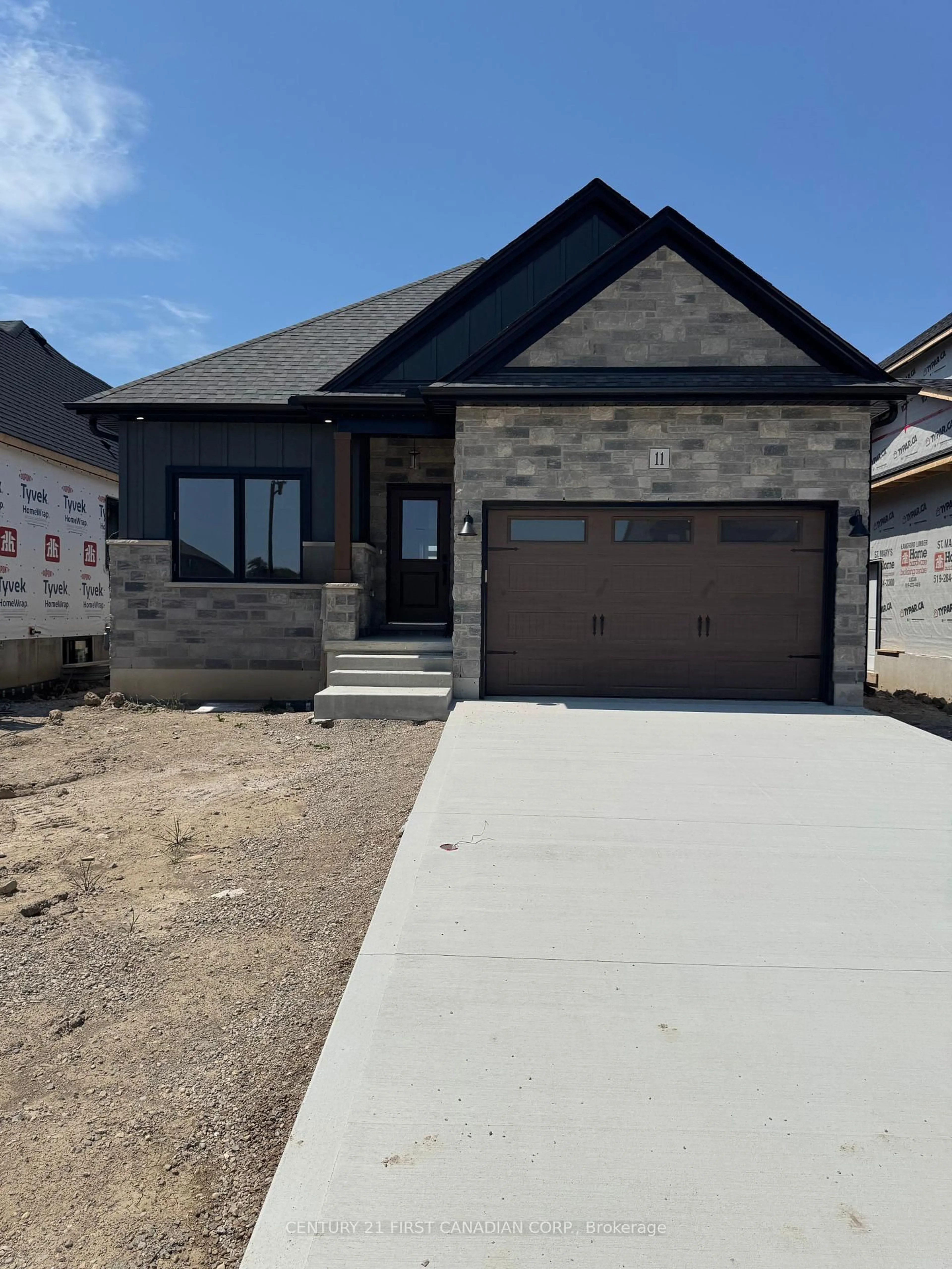 Home with brick exterior material, street for 11 Sheldabren St, North Middlesex Ontario N0M 1A0