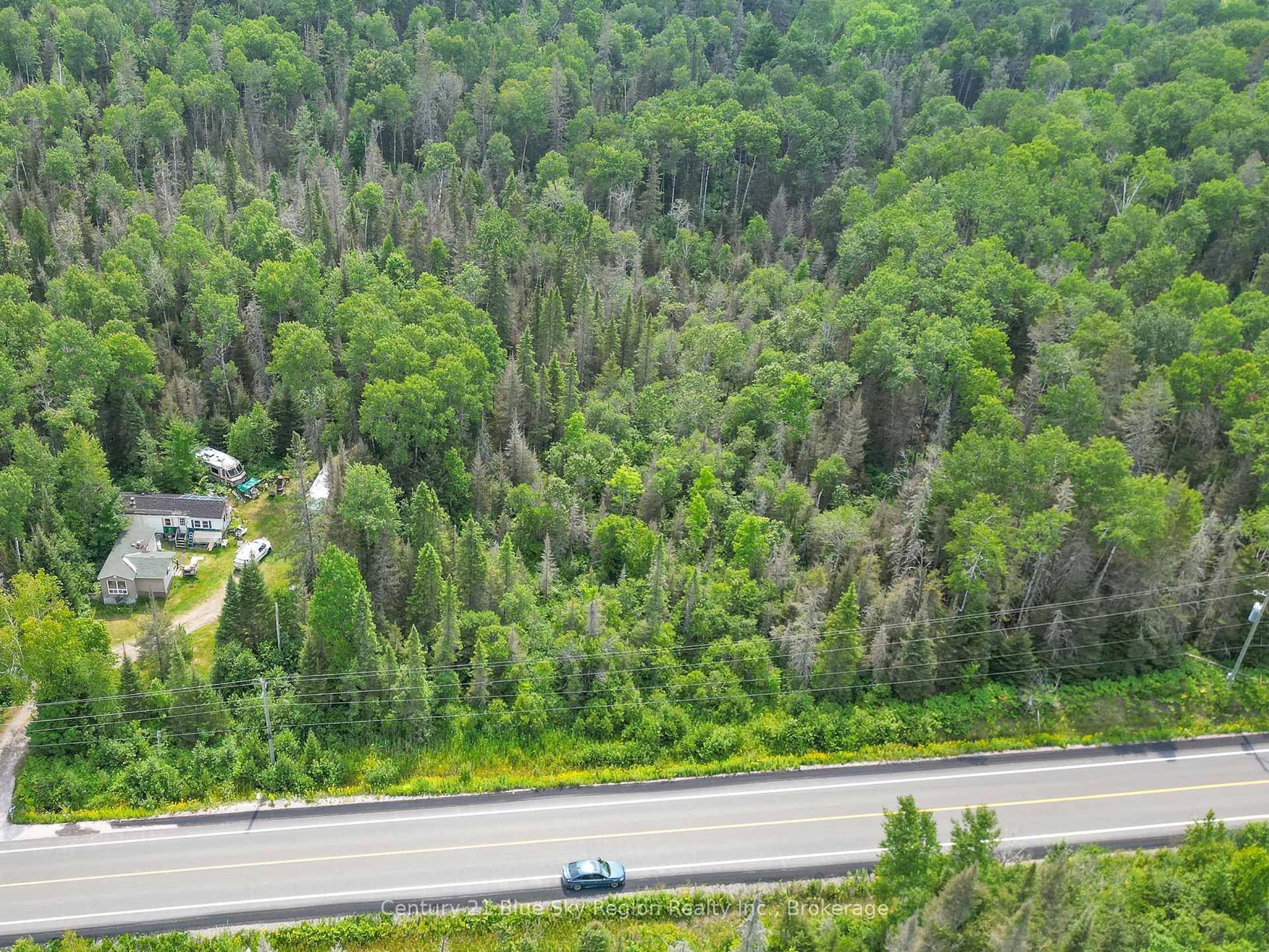 A pic from outside/outdoor area/front of a property/back of a property/a pic from drone, forest/trees view for 2176 Highway 539, West Nipissing Ontario P0H 2C0