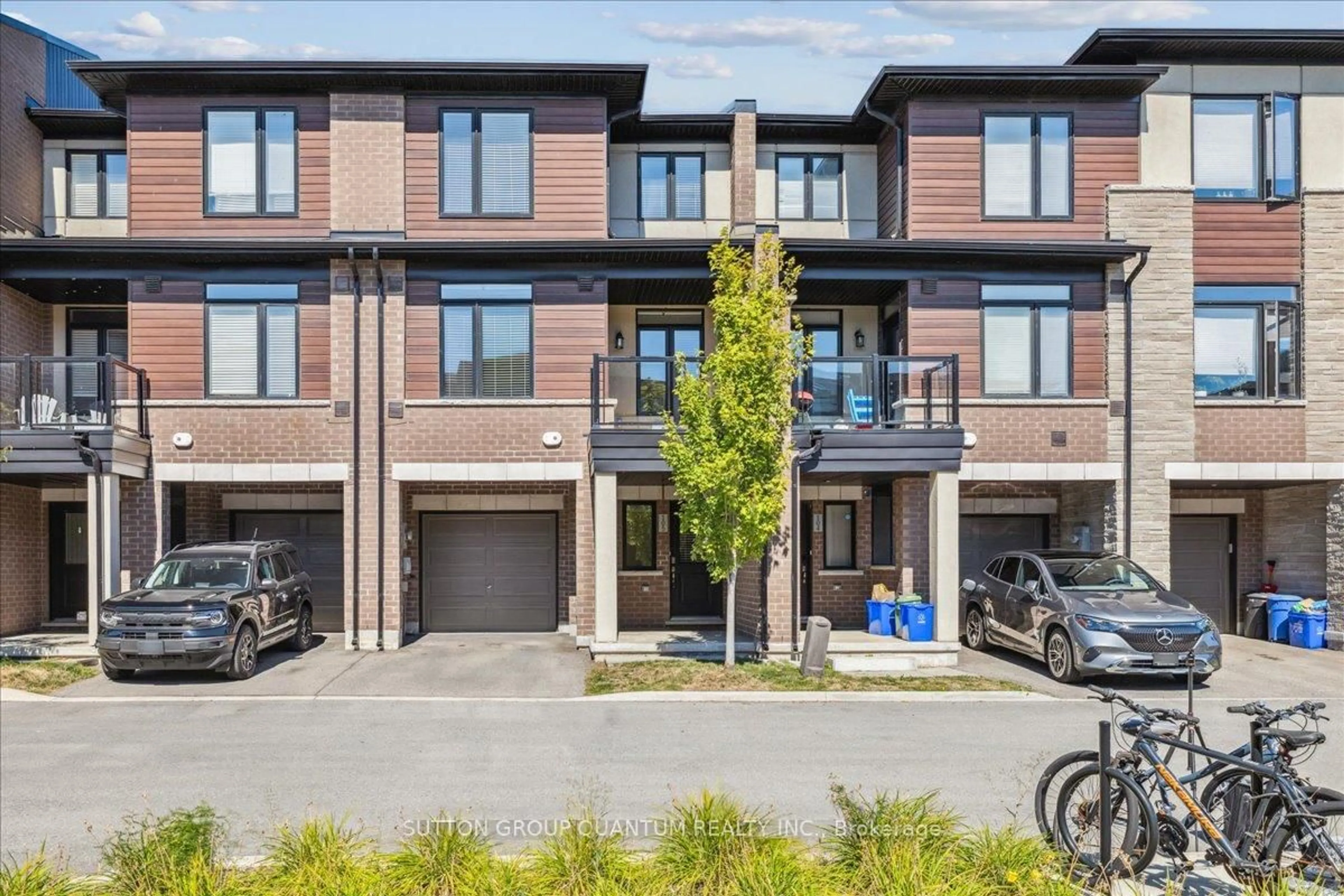 Home with brick exterior material, street for 590 North Service Rd #105, Hamilton Ontario L8E 0K5