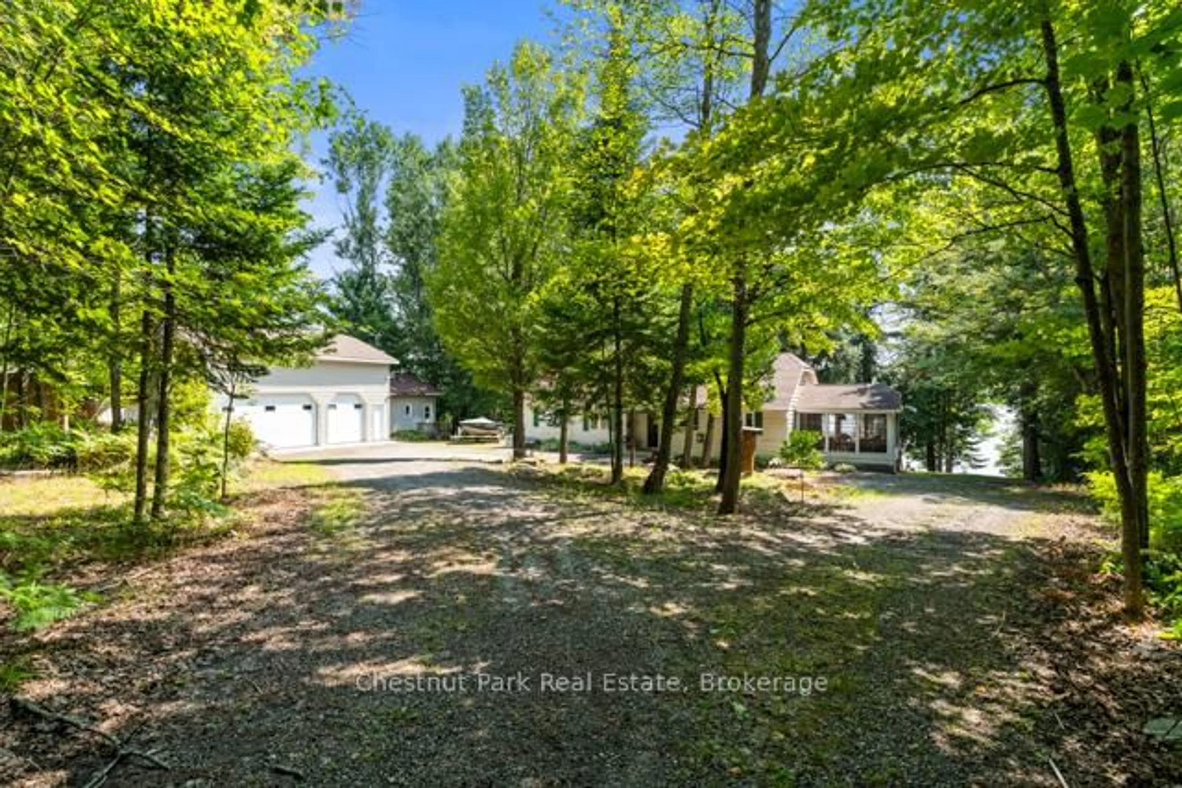 A pic from outside/outdoor area/front of a property/back of a property/a pic from drone, forest/trees view for 95 Haushield Rd, Parry Sound Remote Area Ontario P0H 1A0