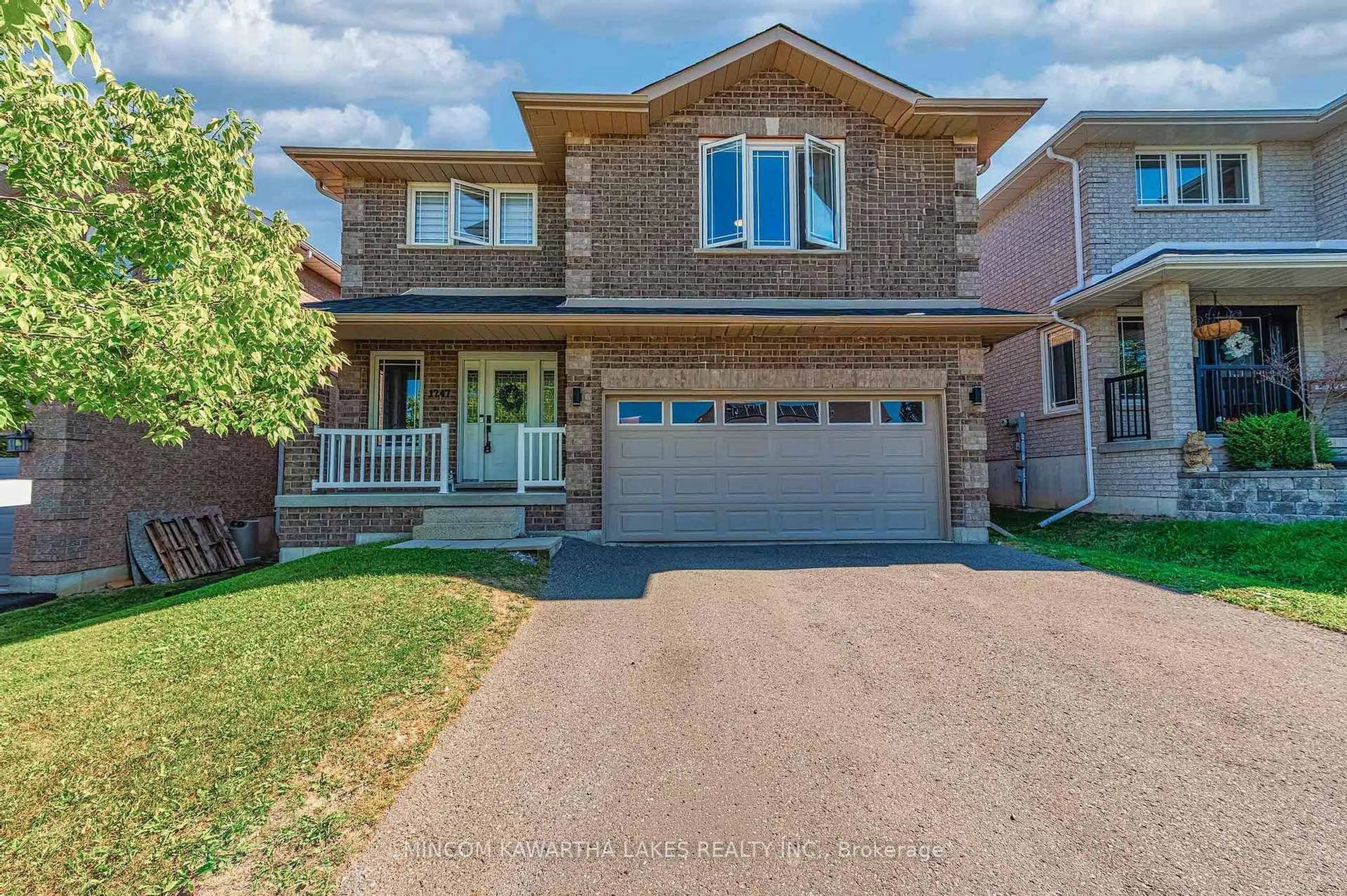 Home with brick exterior material, street for 1247 Haggis Dr, Peterborough Ontario K9K 2S9