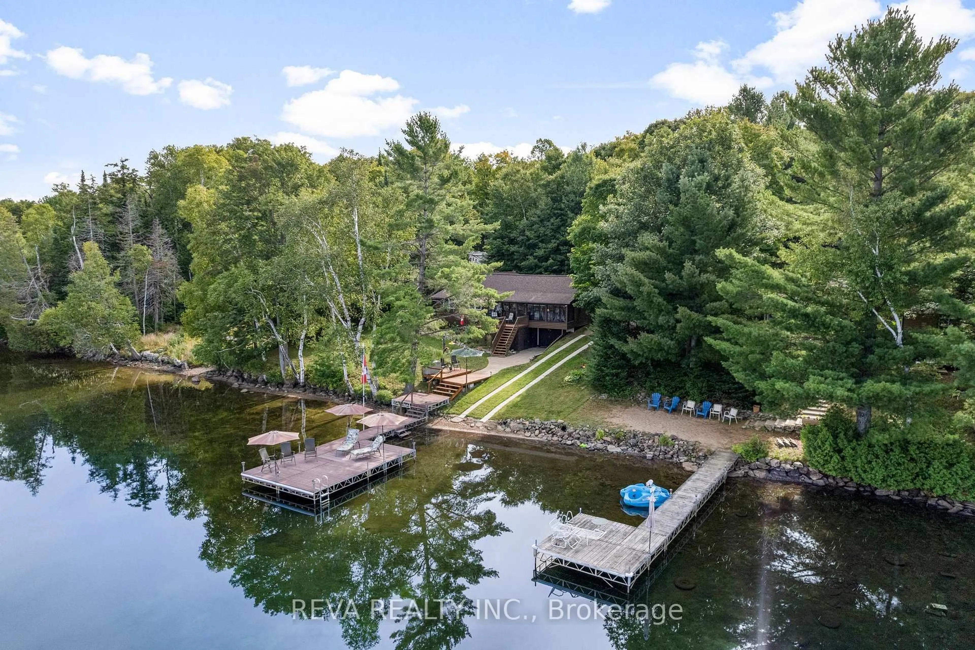 A pic from outside/outdoor area/front of a property/back of a property/a pic from drone, water/lake/river/ocean view for 67 Purdy Lane, Combermere Ontario K0J 1L0