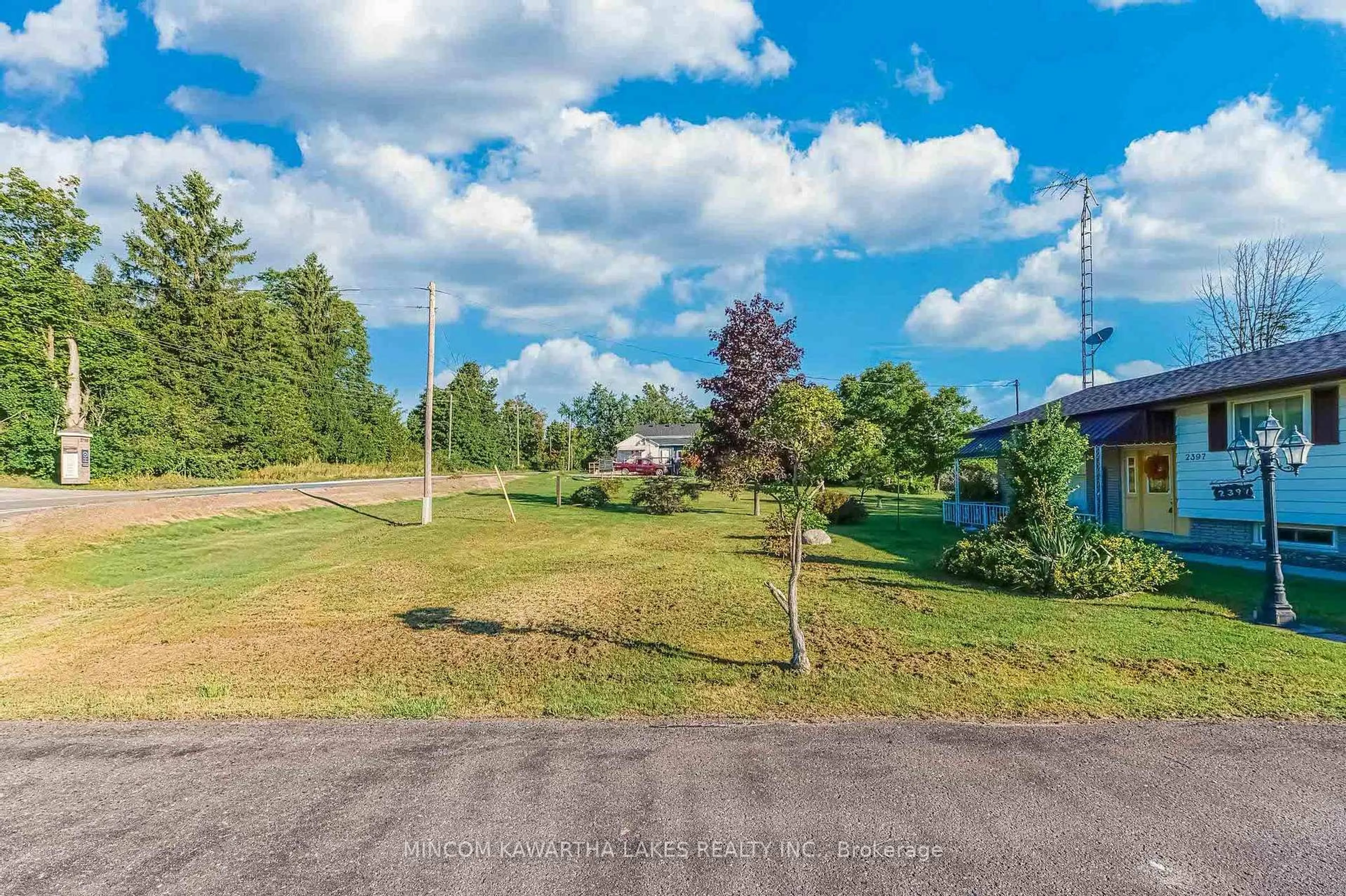 A pic from outside/outdoor area/front of a property/back of a property/a pic from drone, unknown for 2397 Queen Mary St, Cavan Monaghan Ontario L0A 1C0