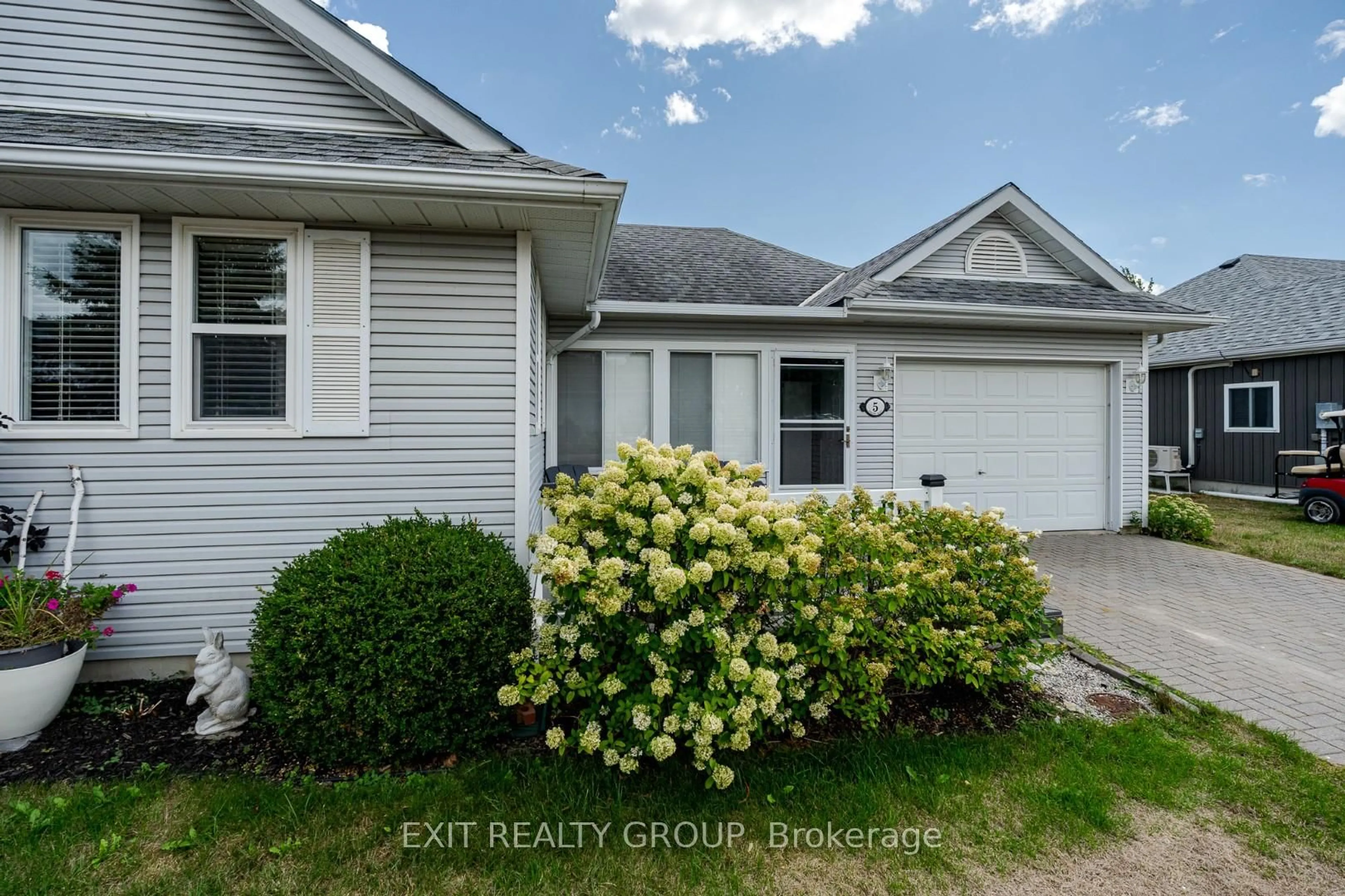 Home with vinyl exterior material, street for 5 Empire Blvd, Prince Edward County Ontario K0K 3L0