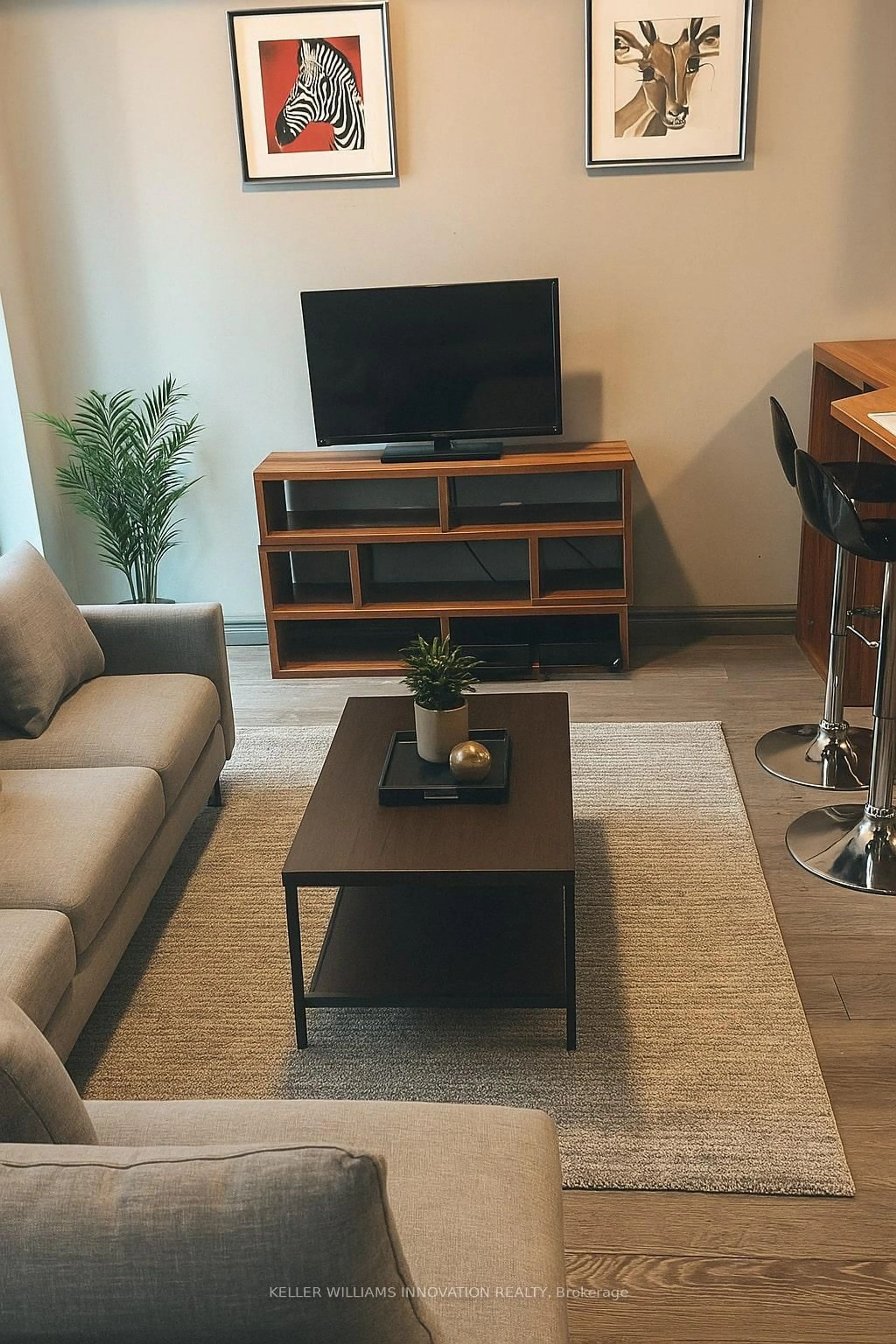 Living room with furniture, wood/laminate floor for 321 Spruce St #506, Waterloo Ontario N2L 0G4