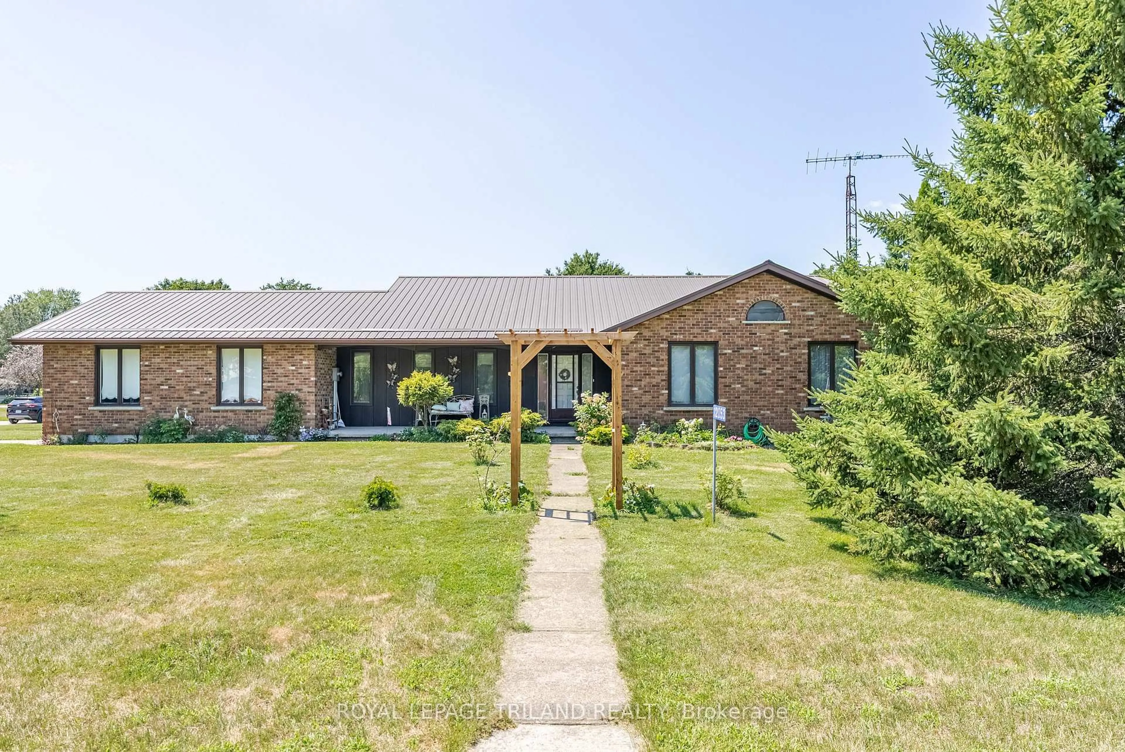 Home with brick exterior material, street for 12053 Whittaker Rd, Malahide Ontario N0L 2J0