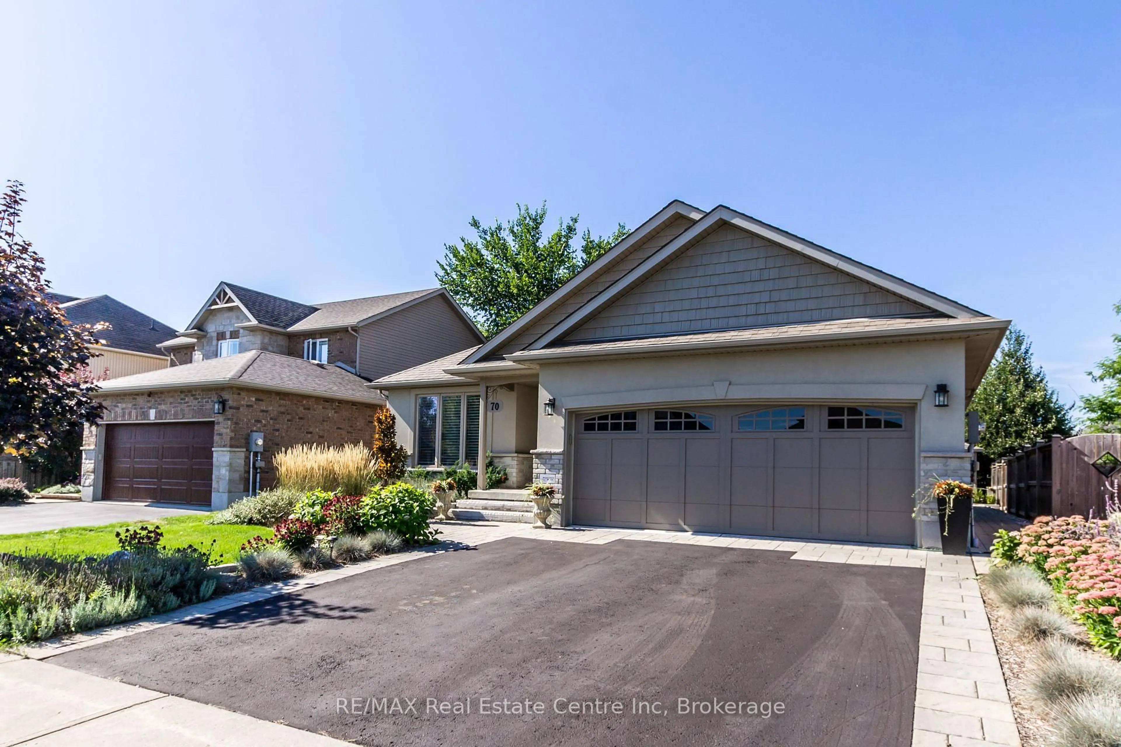 Home with vinyl exterior material, street for 70 Mcgowan St, Centre Wellington Ontario N0B 1S0