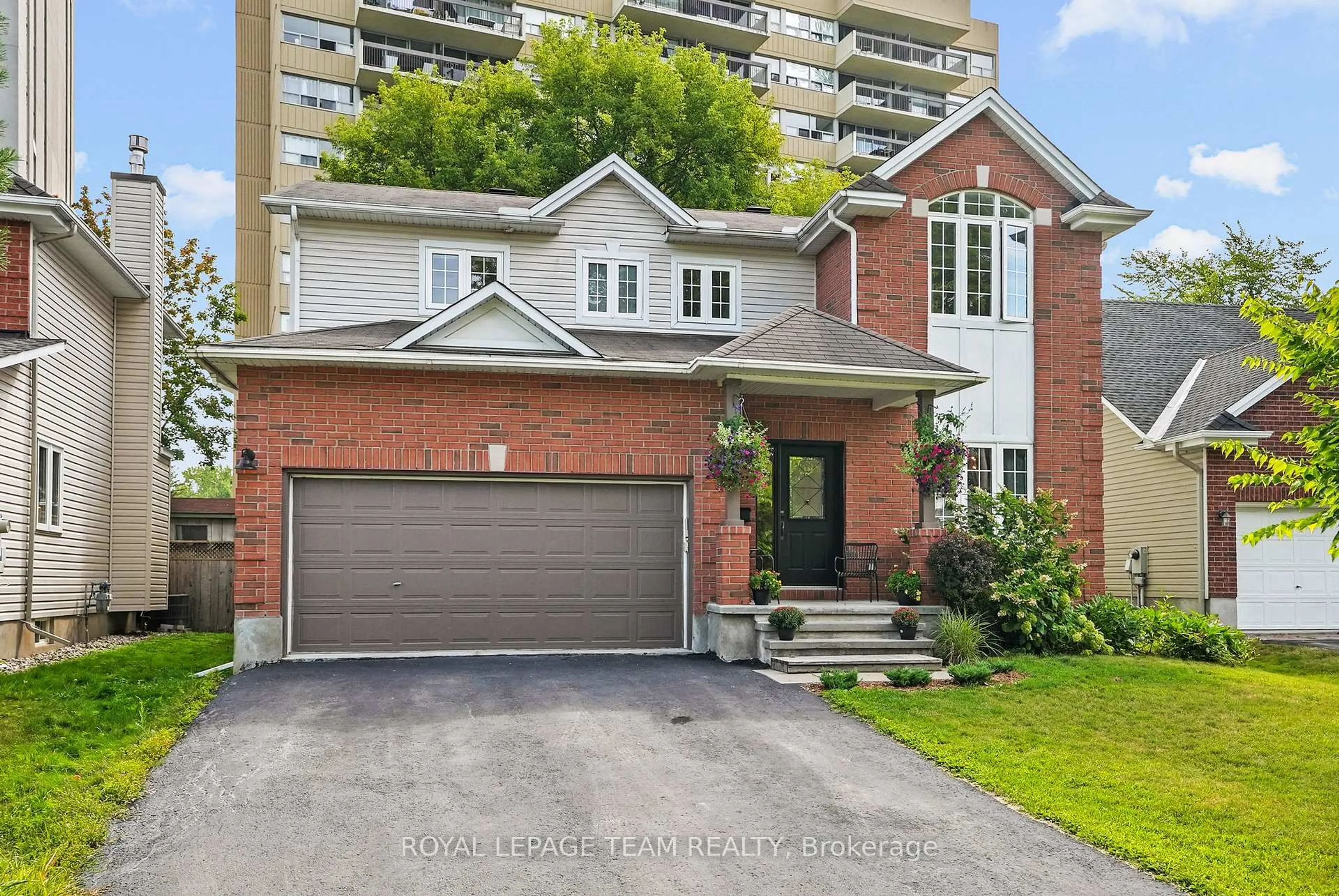 Home with brick exterior material, street for 2122 Saunders Ave, Ottawa Ontario K2A 4C7